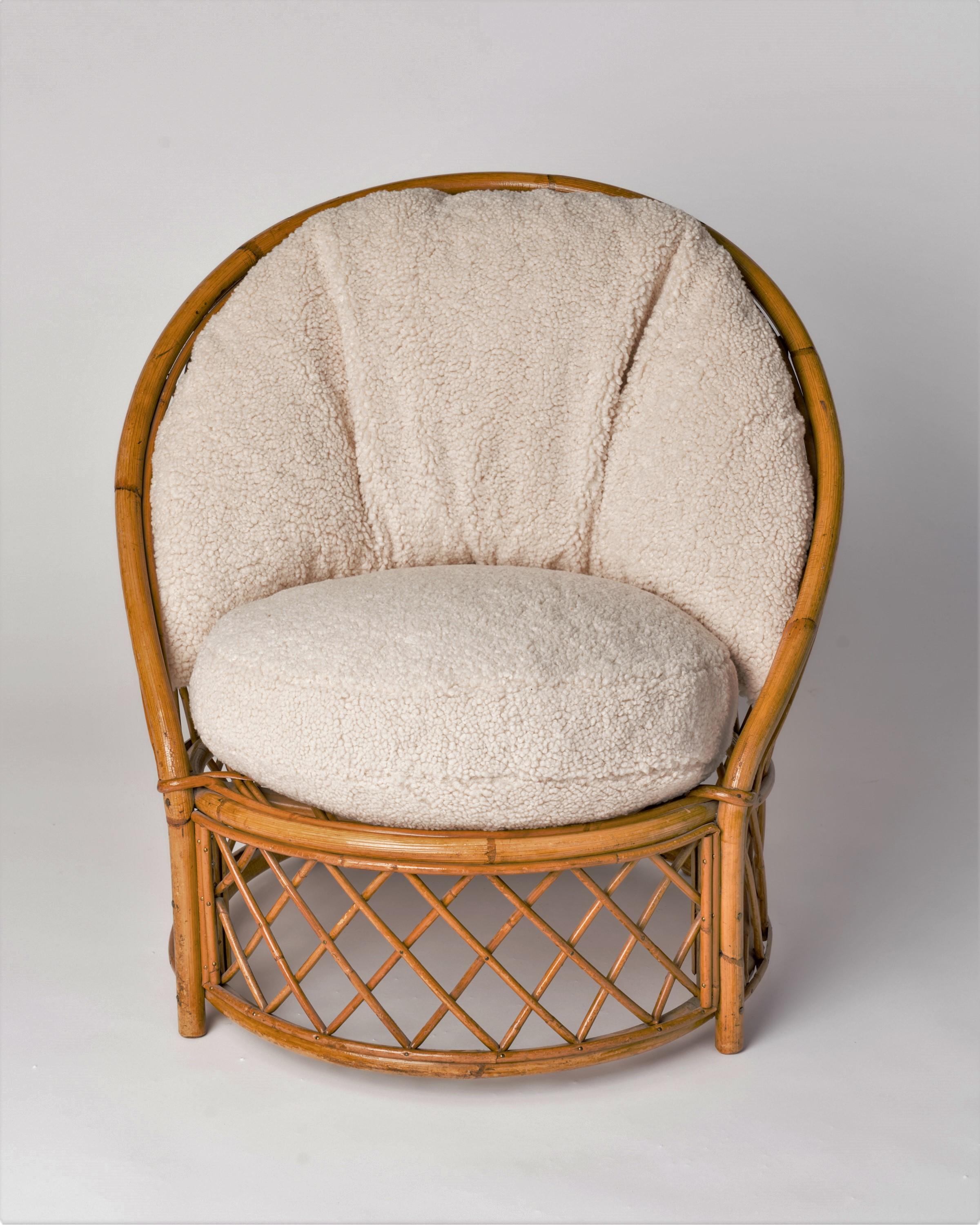 Signed Bergère Rattan Chair by Audoux Minnet w. Cream Bouclé Cushions, France In Good Condition In New York, NY