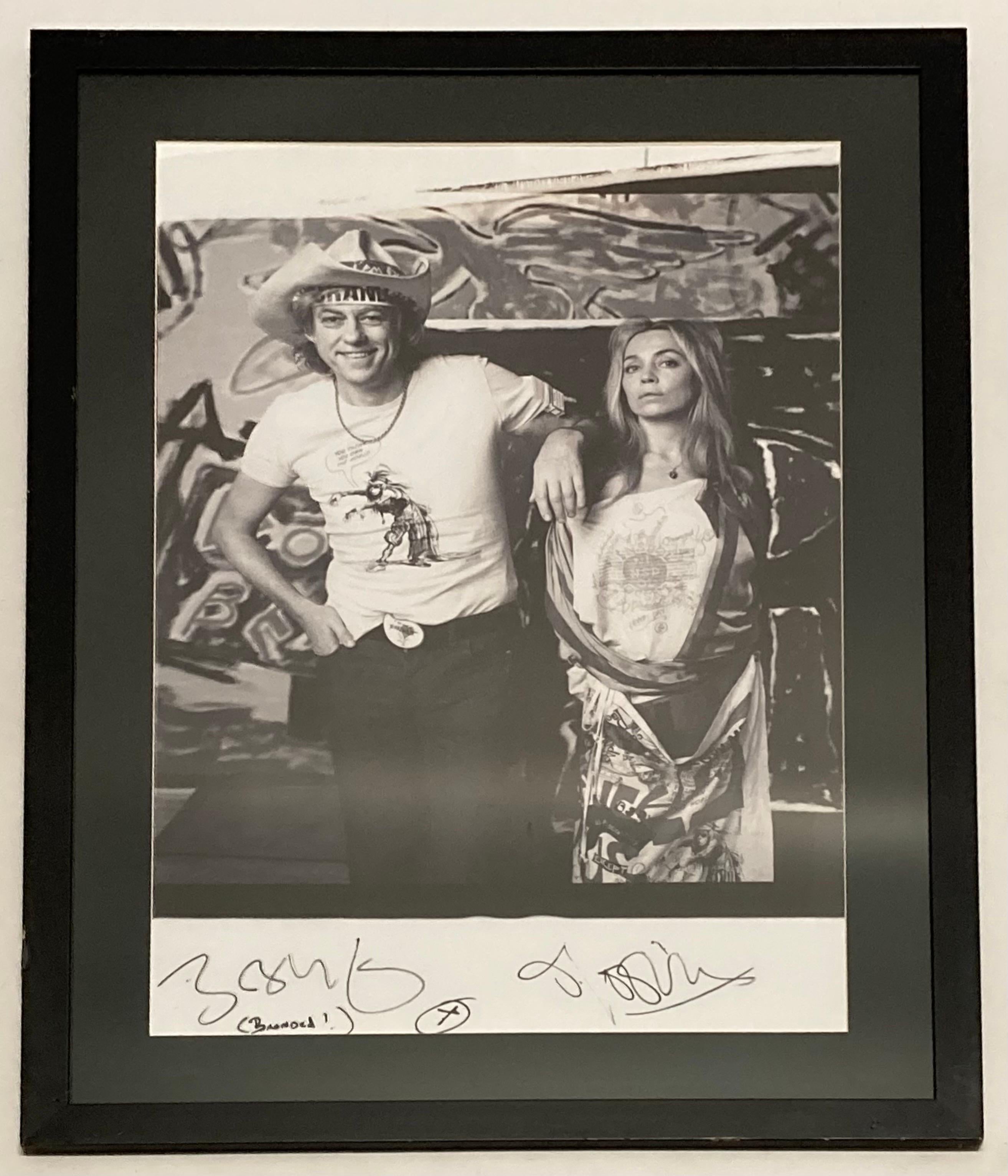 An original one-off large format Polaroid photograph of Bob Geldoff & Jeanne Marine for the Vivienne Westwood Active Resistance limited edition book produced by Opus. Photographer Zenon Texeira.
Signed by Bob Geldoff & Jeanne Marine in marker