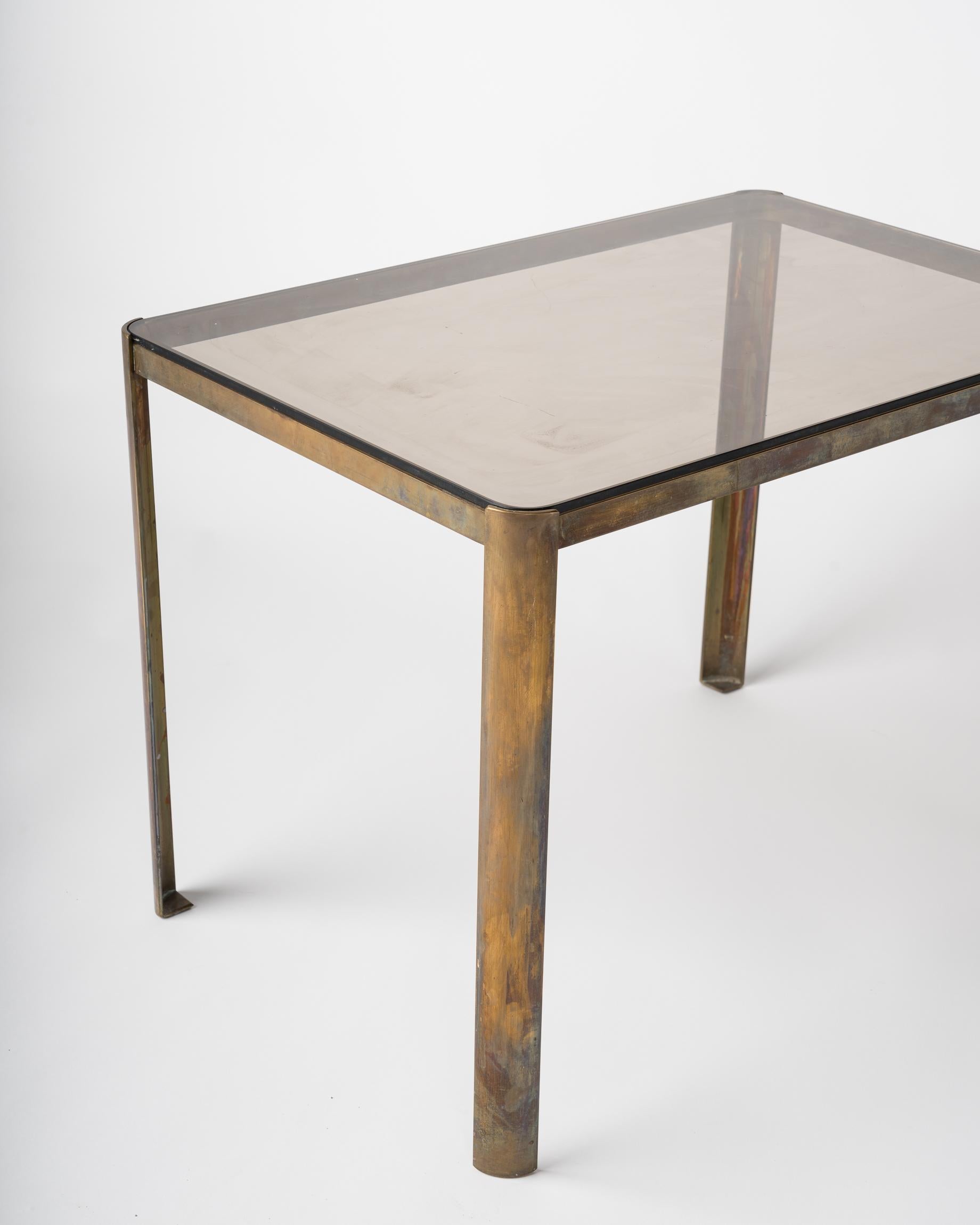 Patinated solid bronze side table. Broncz, attributed to Jacques Quinet for Maison Malabert. 
Price does not include shipping nor possible duties related charges.