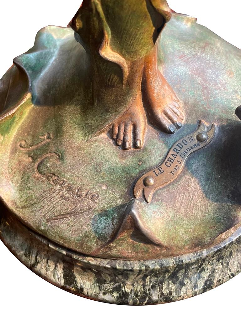 Julien Caussé Bronze
The signed bronze “The Thistle”, created around 1890 in Belle Epoque France, is an impressive work of art that embodies the artistic sophistication of this period. Signed by J. Causse and labeled “Le Charon”, this masterpiece