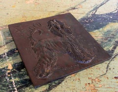 Targa commemorativa in bronzo firmata con l'immagine di un cane e la scritta "Sunny".