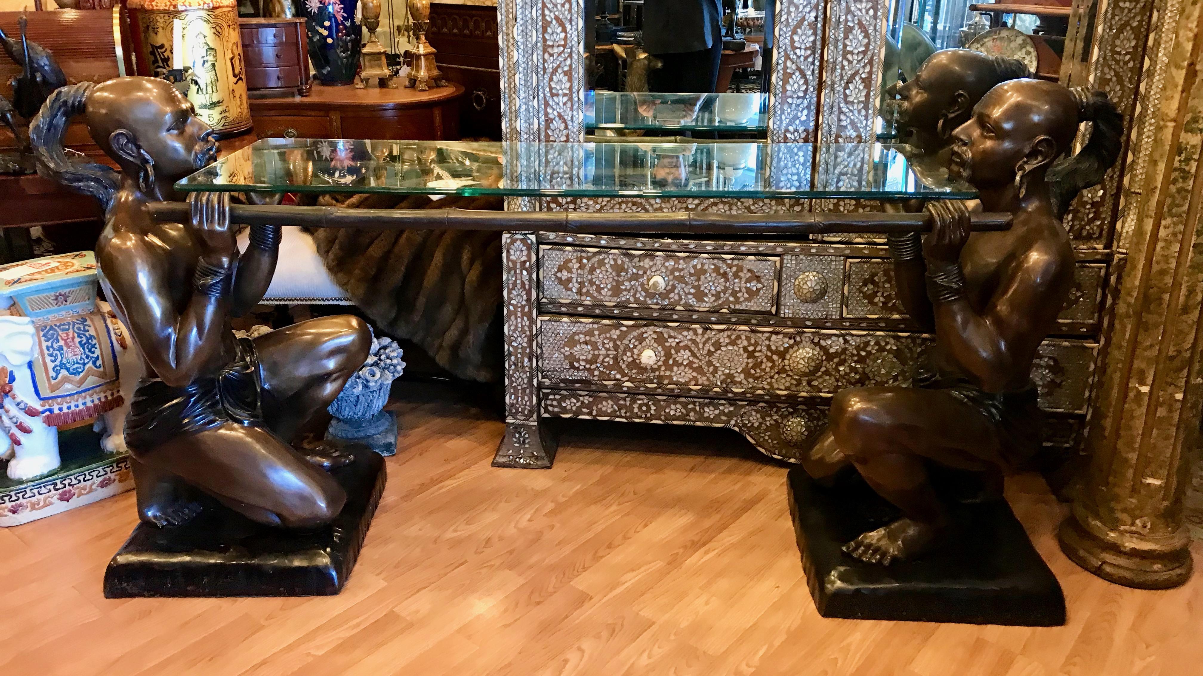 Impressive and grandly scaled -a most unusual eye catching table.
The figures have a beautiful bronze patina and life-like in appearance.
signed/ after C. M. Clodion
The shelf is 32