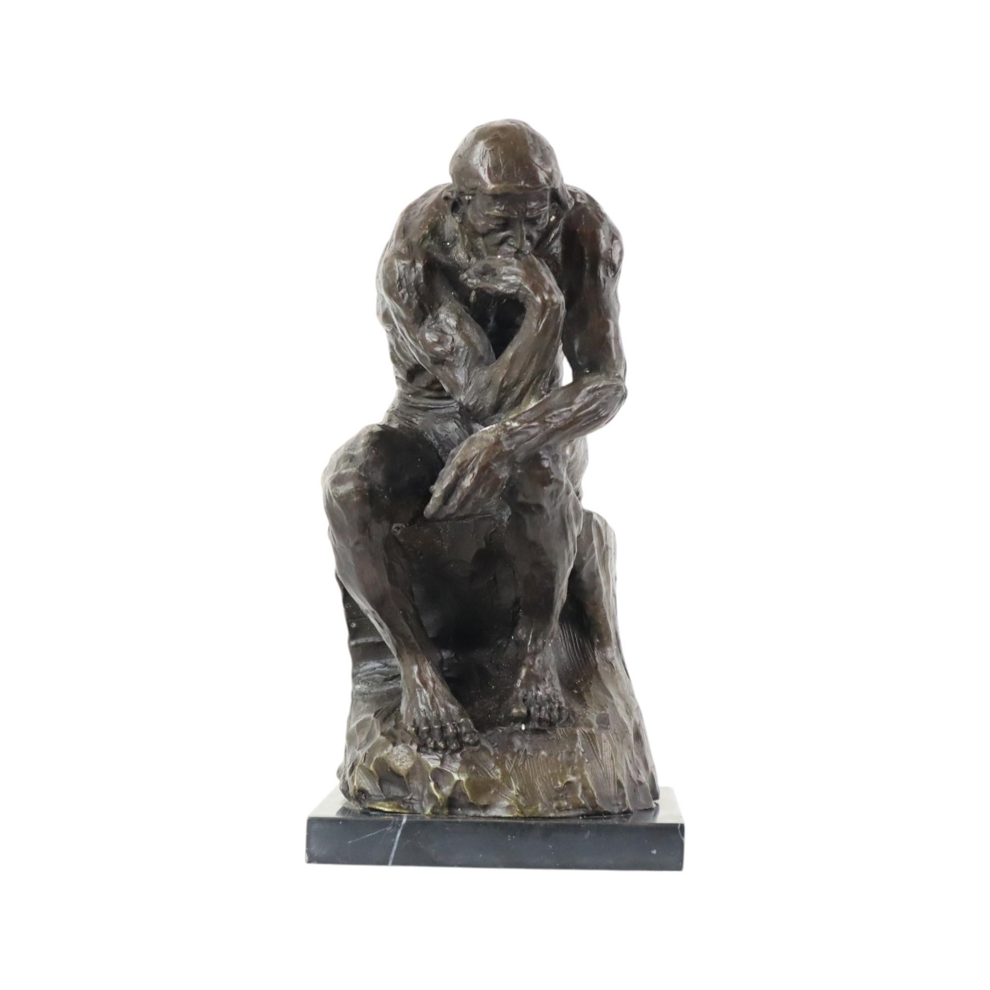 Beautiful bronze statue of the world-famous statue 'The Thinker', stylishly mounted on a rectangular black marble base, after Auguste Rodin, signed on the back by the maker, second half of the 20th century.

Beautiful reproduction of a classic