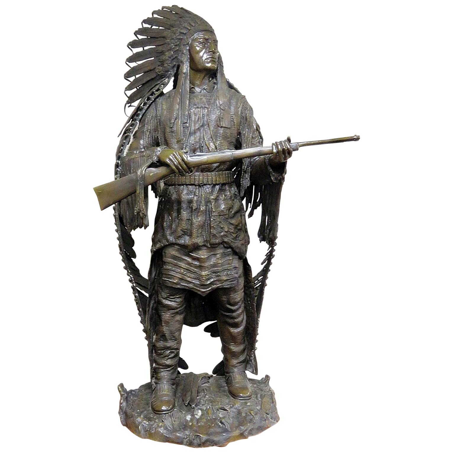 Signed Carl Kauba Bronze Indian Chief with Headress and Rifle Sculpture