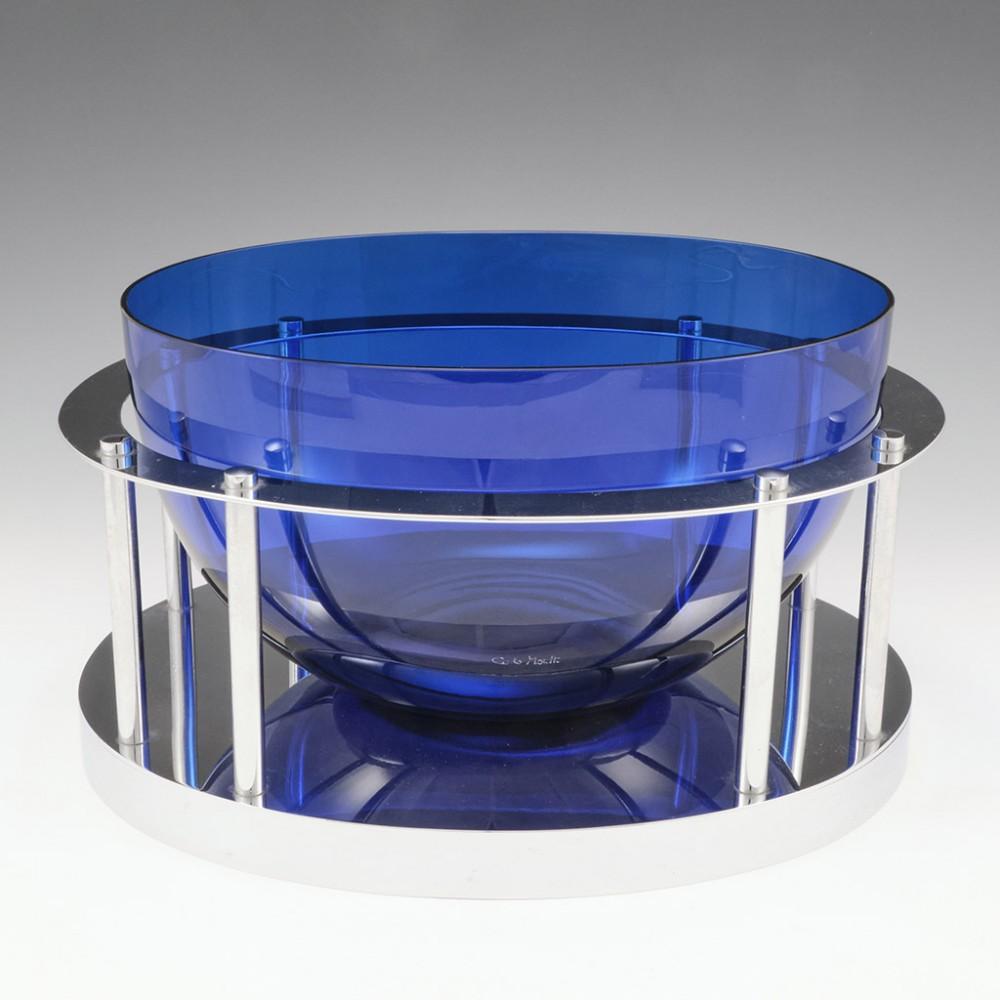Signed Carlo Moretti Bowl and Metal Stand, c1985

Moretti founded his own company in 1958 with his brother Giovanni. Born in Murano he decided to become a lawyer before realising his destiny. The Murano glass master passed away in 2008. This was