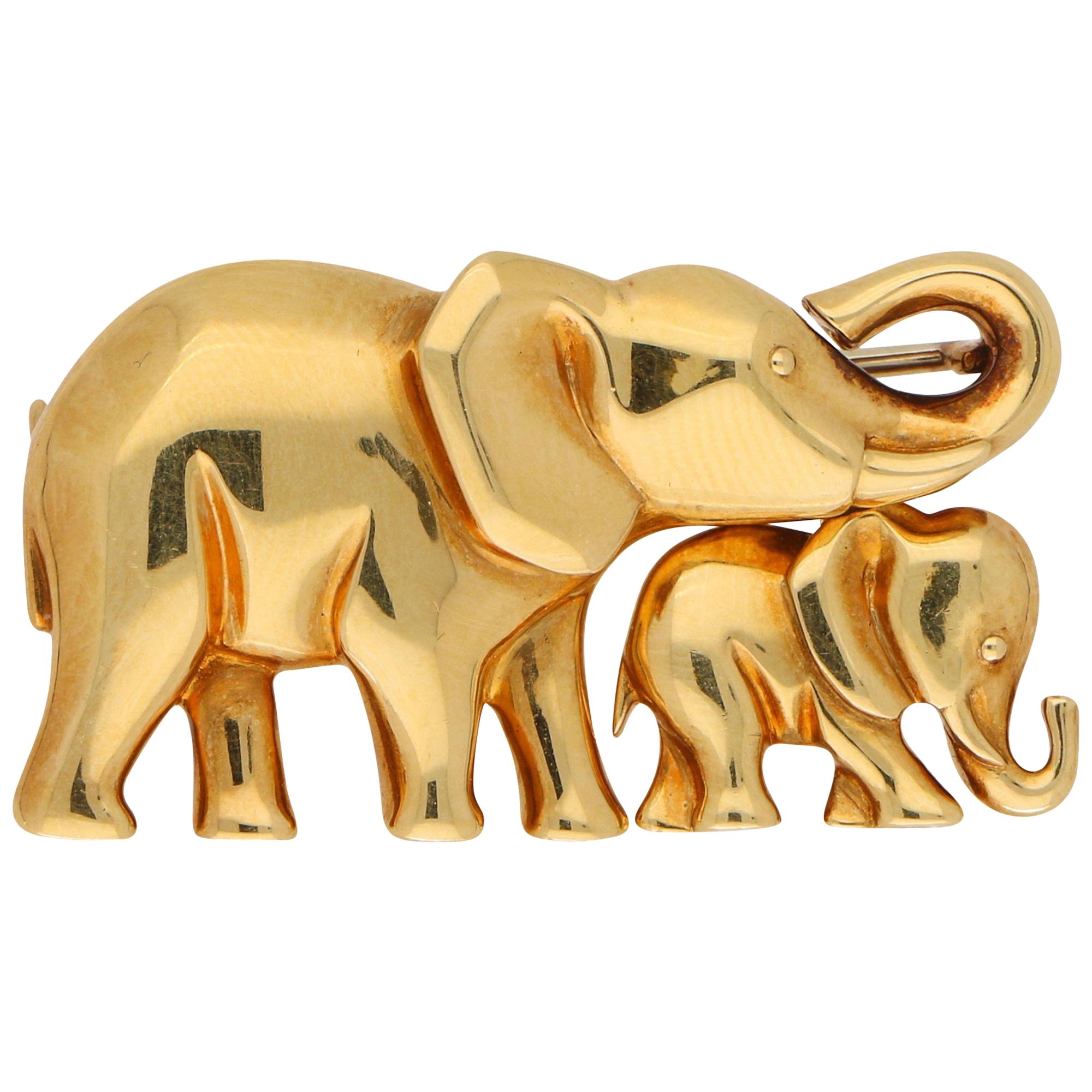 Broche / Collier pendentif éléphant et veau de Cartier en or jaune 18k