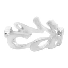 Cartier, bague à logo script en or blanc 18 carats signée