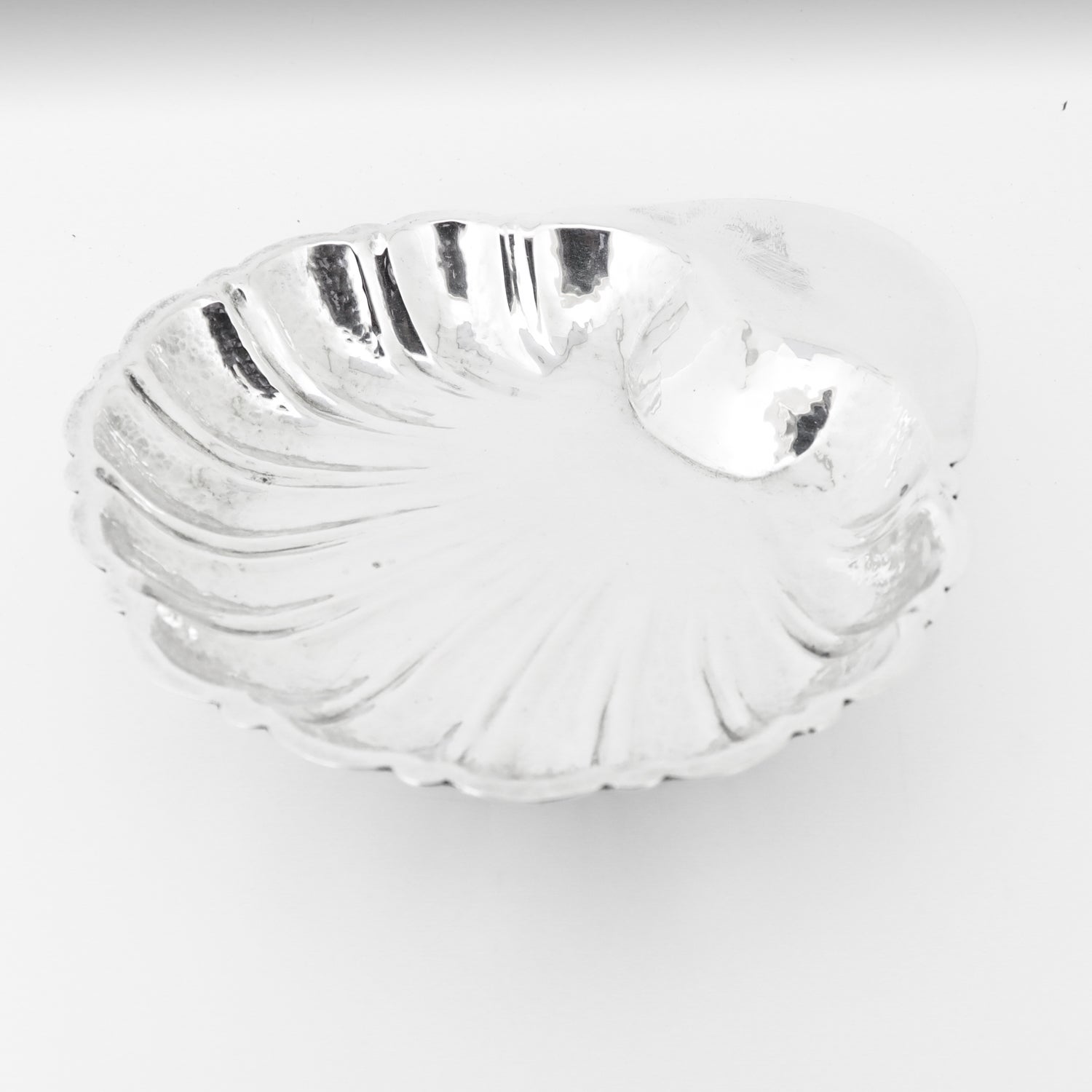 Signed Cartier Hand-Hammered Sterling Silver Shell Shaped Bowl or Vide Poche In Good Condition In Philadelphia, PA