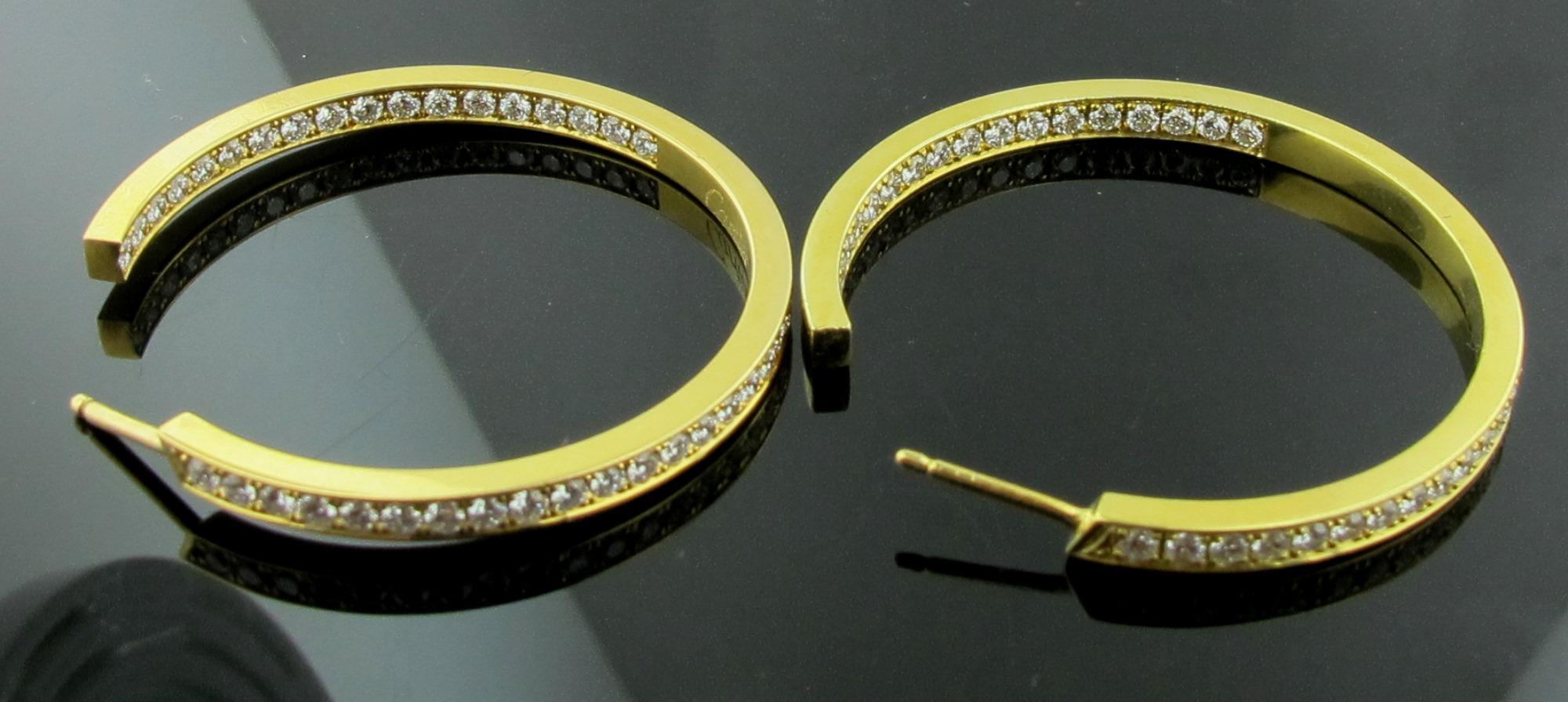 Women's or Men's Signed Cartier Inside Out Diamond Hoop Earrings in 18 Karat Yellow Gold