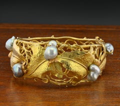 Bracciale firmato Cecconi a foglie e perle 18 KT della metà del secolo scorso