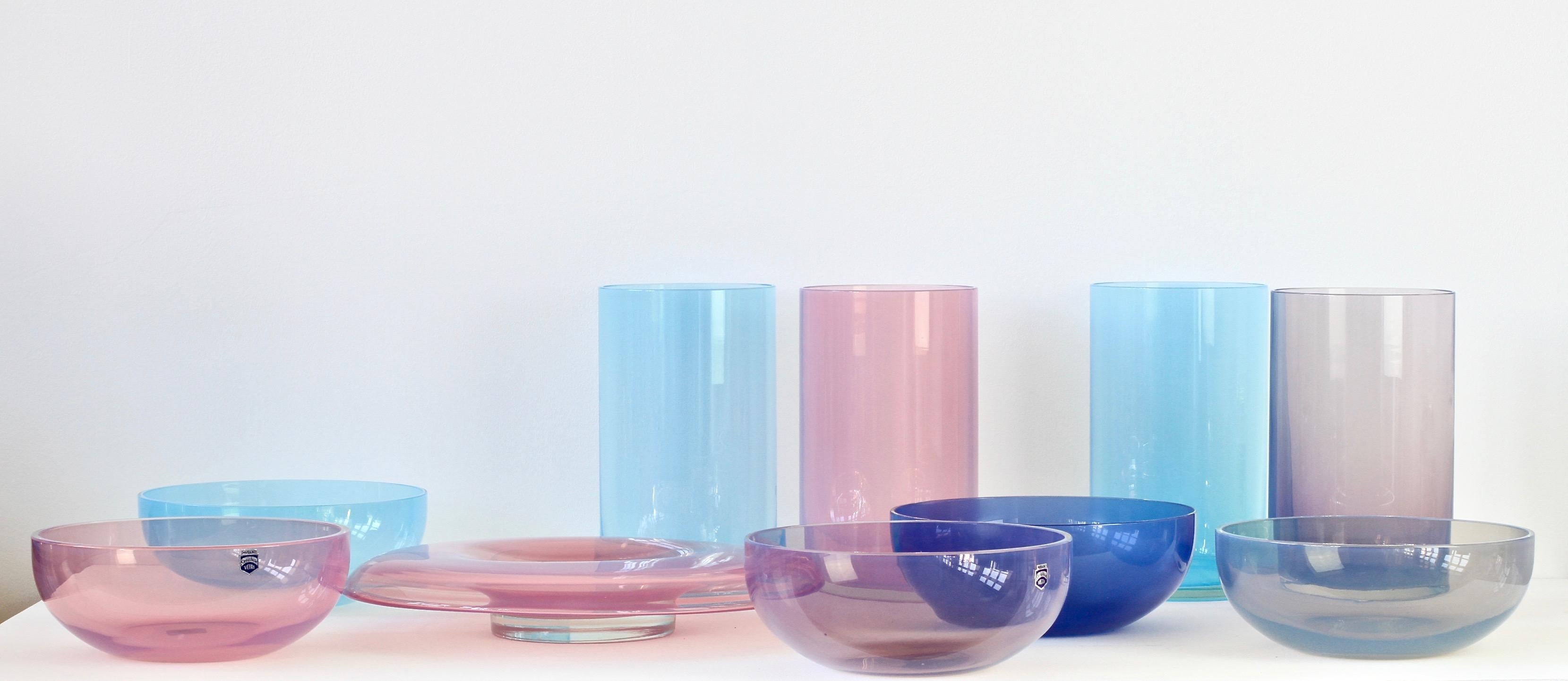 Signed set or ensemble of Murano glass bowls, vases and vessels by Cenedese circa 1960s. Wonderful translucent colors of vibrant blues, aubergine, moss green and pink. Simplistic yet elegant forms - almost futuristic - especially the pink