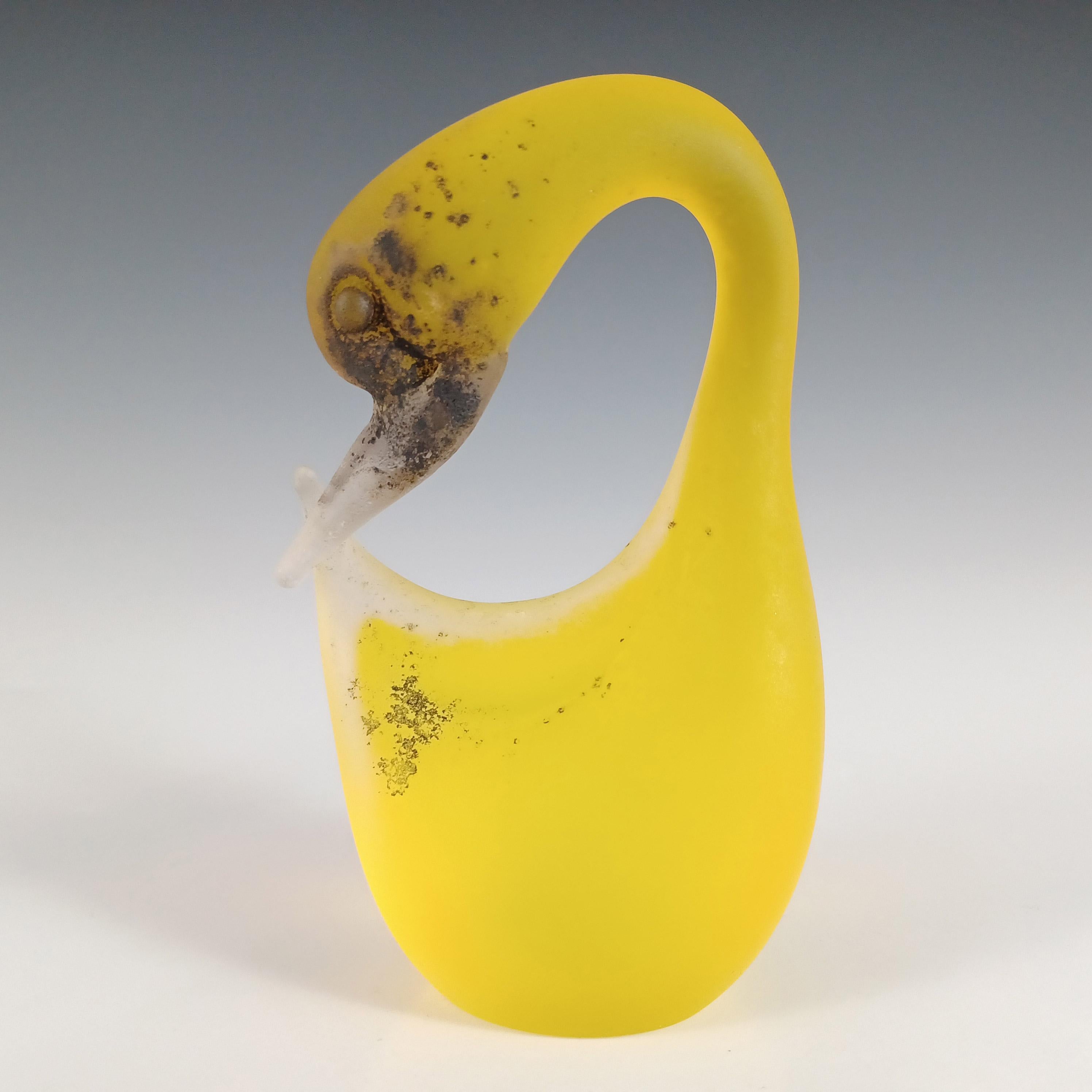 Here is a beautiful Venetian yellow glass swan sculpture, made on the island of Murano, near Venice, Italy. Made by Cenedese, signed to base. Produced in the Venetian scavo technique, which means 