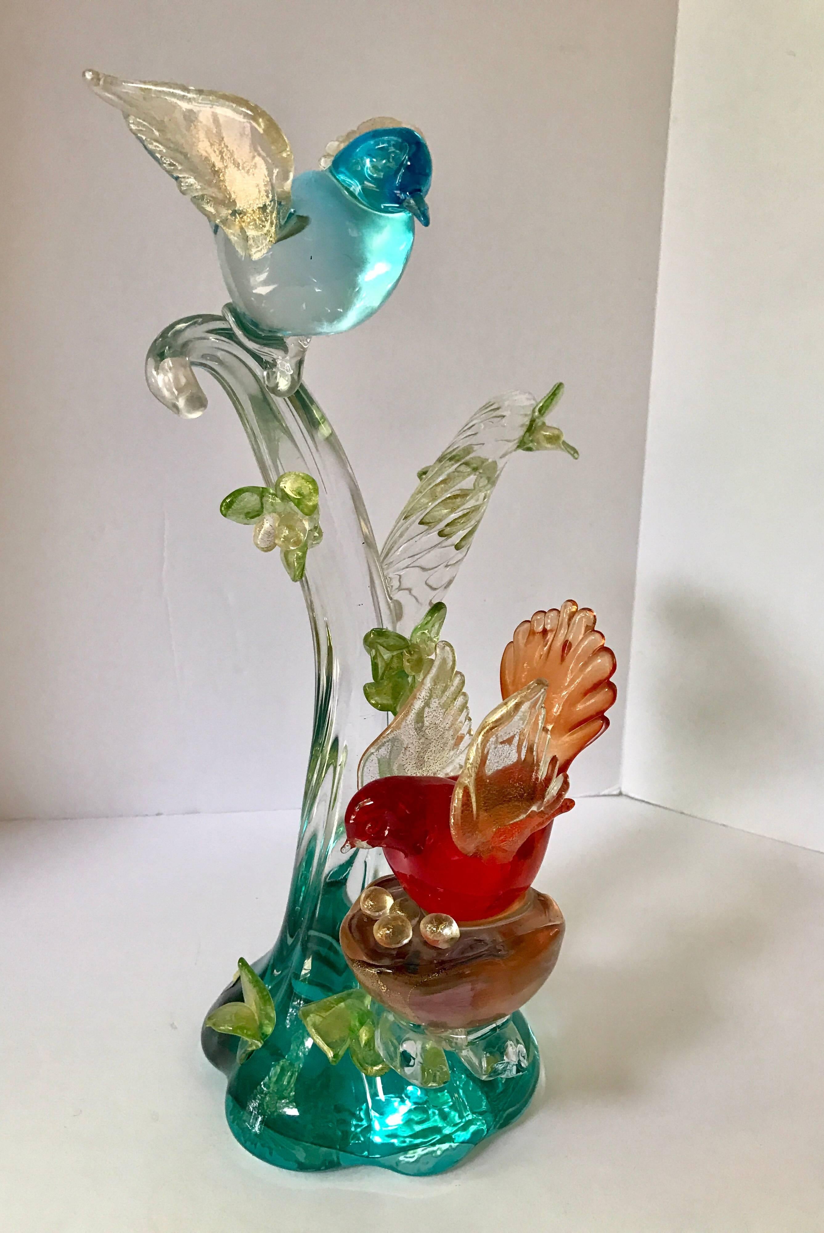 Magnificent singed Cenedese Vetri Murano glass sculpture. The colors are vibrant to say the least and include greens, blues, red, gold and turquoise. Weight is 25 pounds and it is from the early 1970s.