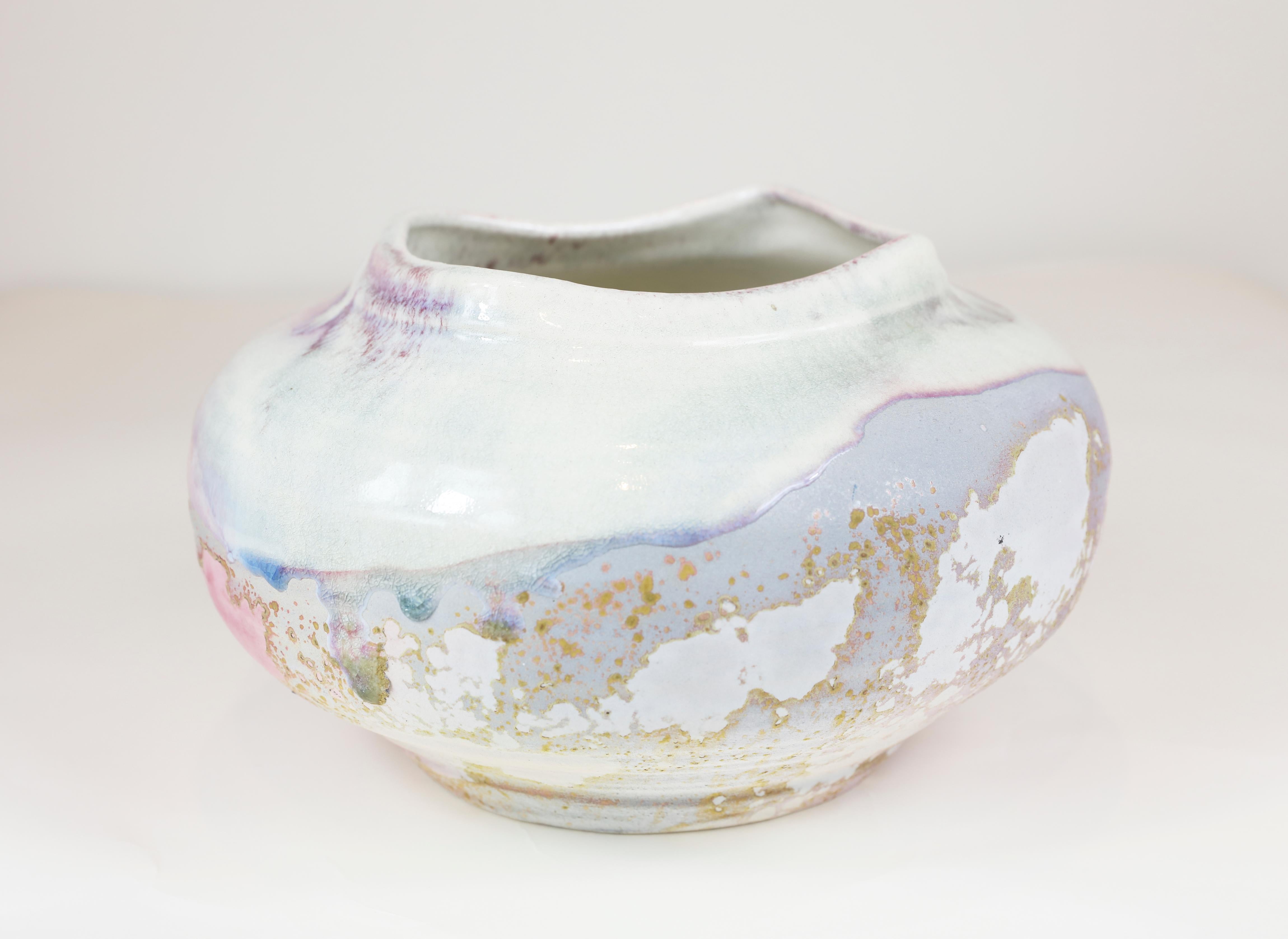 Signed ceramic gallery vase

Measures: 10