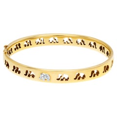 Signed "C'est Laudies" Elephant Bangle with Diamond Accents in 18K Yellow Gold