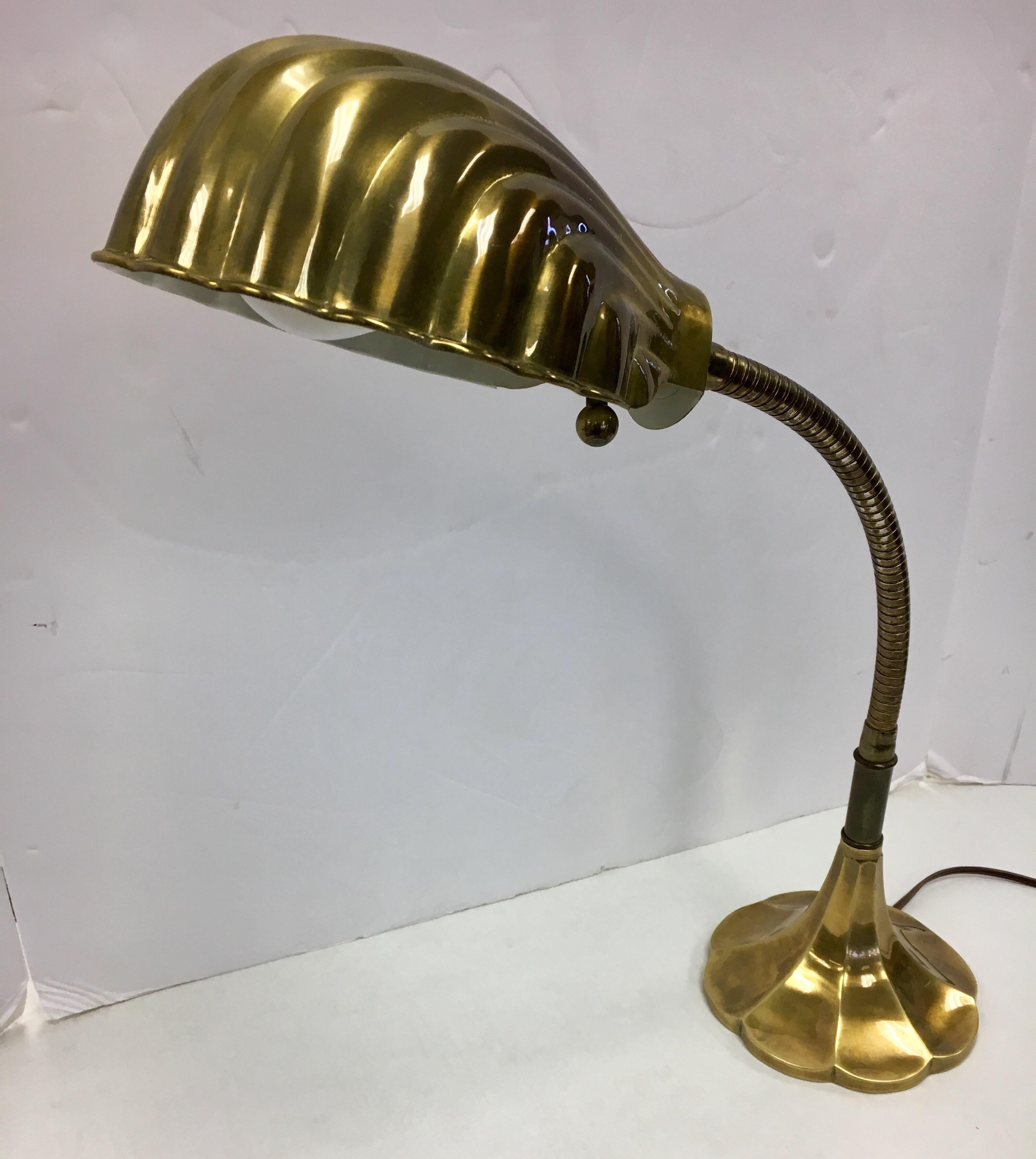 Rare Antonio Gaudi style lamp by Chapman features faux brass shell shade and bronze base with bendable neck. All Chapman hallmarks are present.