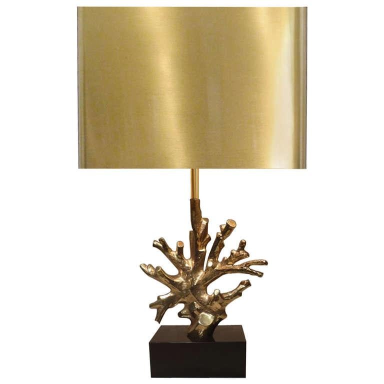 A cast bronze coral lamp resting on a blacked metal base by Charles Paris.

French, Circa 1970's