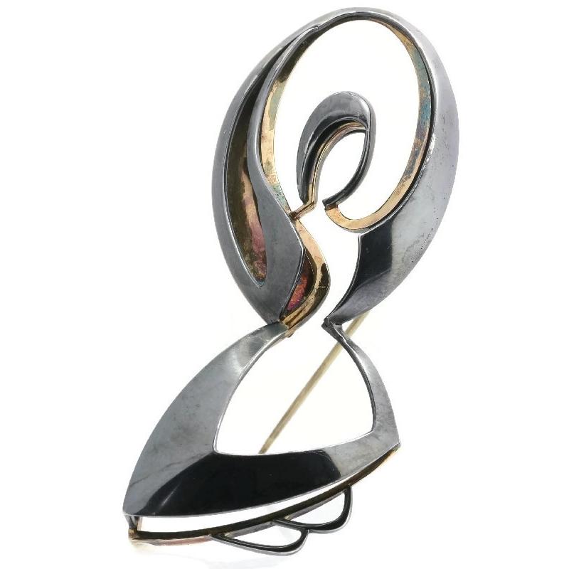 Defining from this design on the rest of Chris Steenbergen's oeuvre, this Dutch brooch is described as his signature piece, once in a private collection and now serving as a collectible piece of future antique jewellery. Representing a rope-jumping