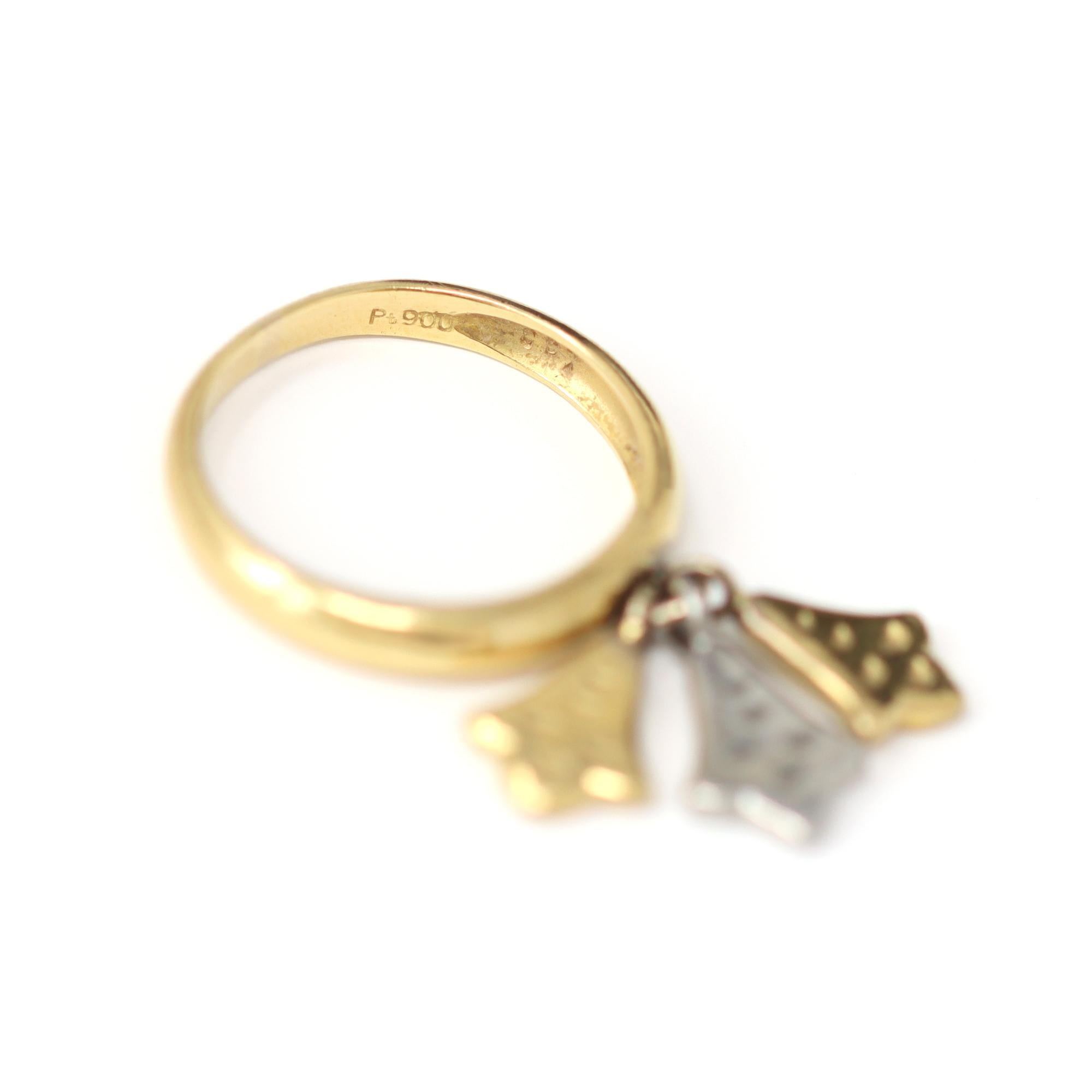 ring with dangling charm