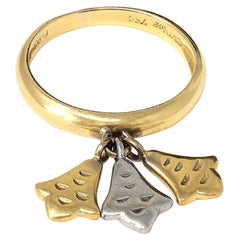Anillo colgante firmado Christian Dior en platino y 18k