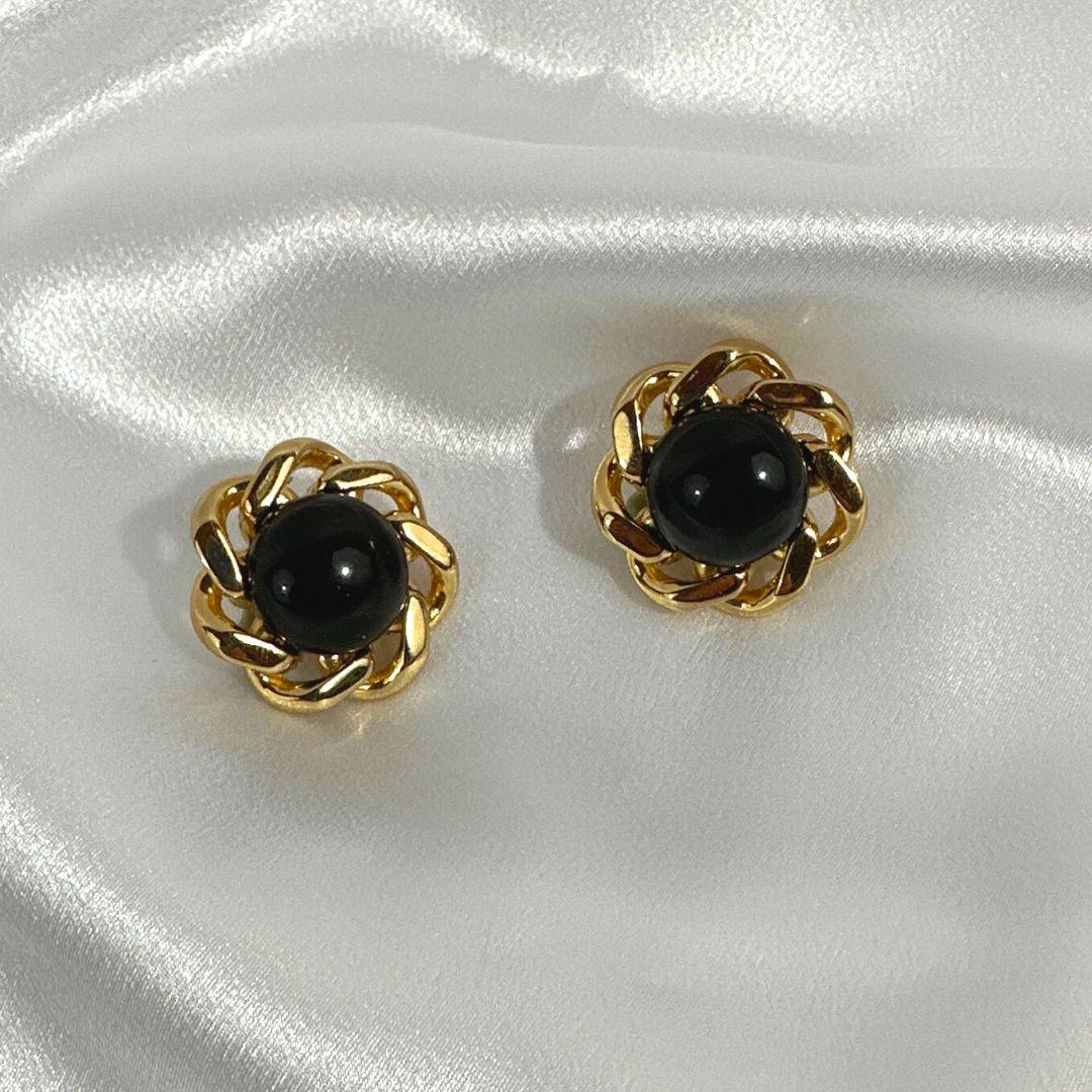 Art Deco Signed Ciner Black Cabochon Glass Floral Clip on Earring For Sale