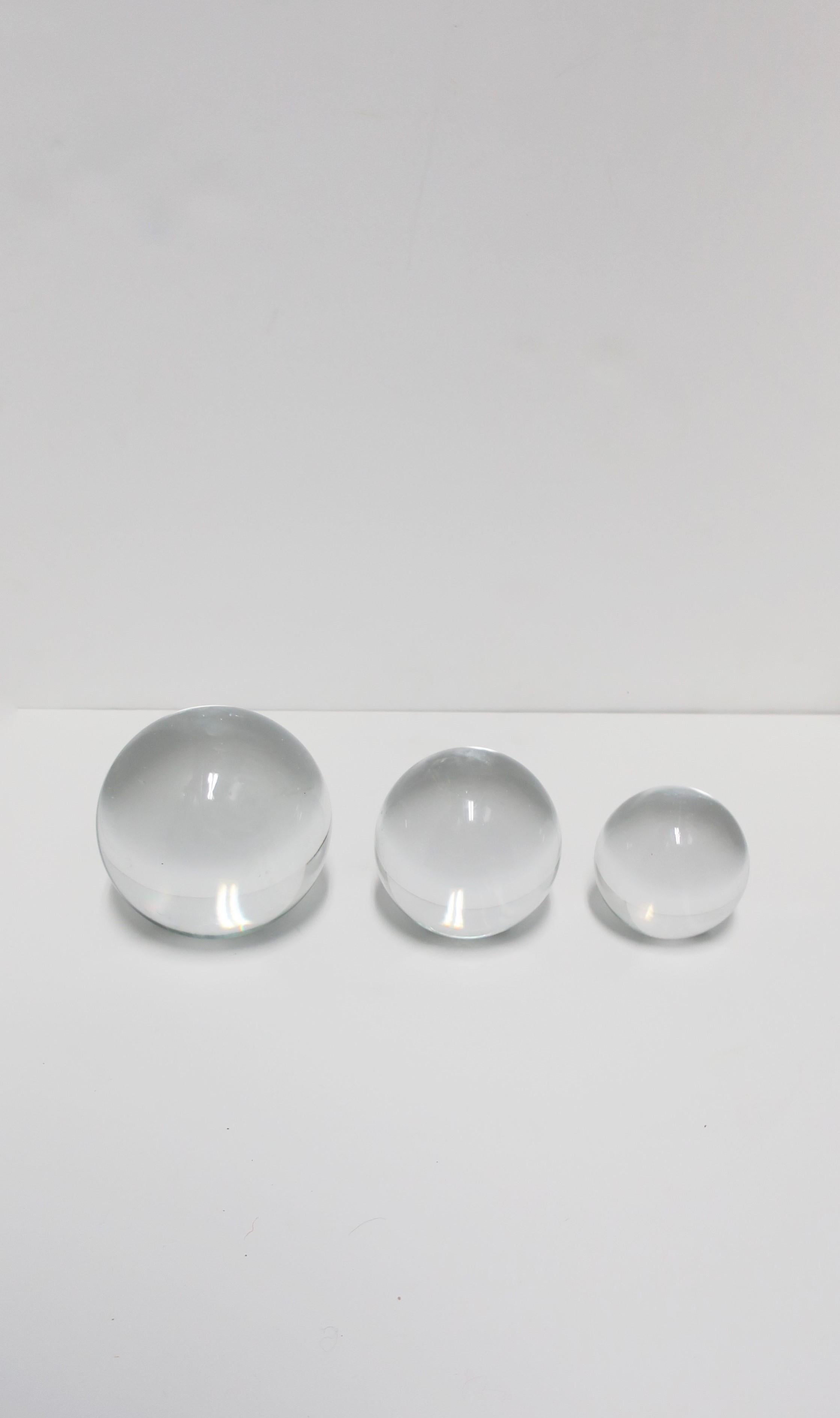 A beautiful set of three (3) signed crystal decorative balls/spheres, circa 1980s, New York. All signed at bottoms' flat edge as shown in last three images. Spheres were purchased in the mid-1980s at the iconic New York modern-design store D.F.