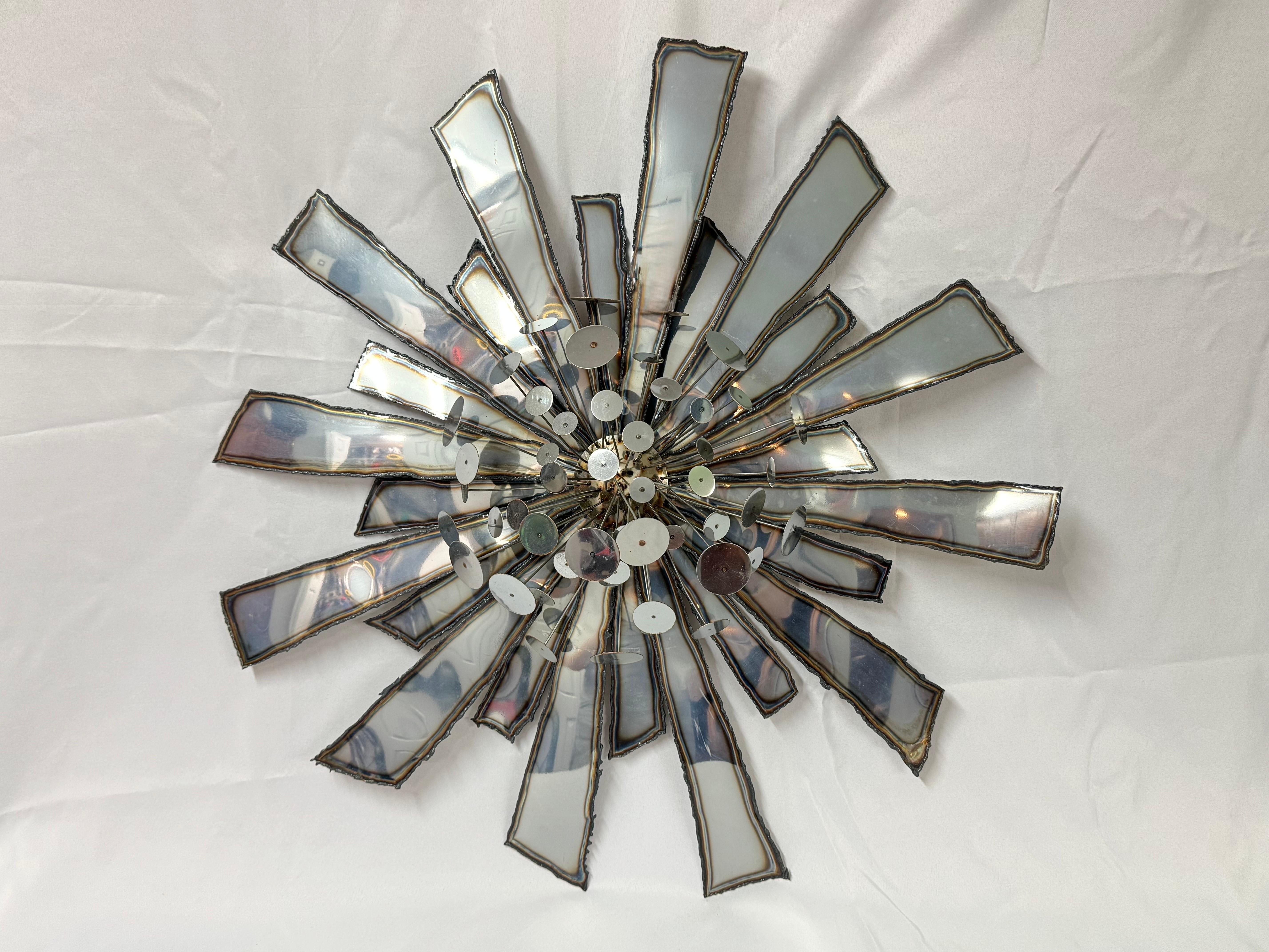Signed Curtis Jere Brutalist Starburst sculpture.  Such a statement piece. Perfect for a focal point in any room. Rare ,authentic signed piece, see photos. Diameter is 34.50