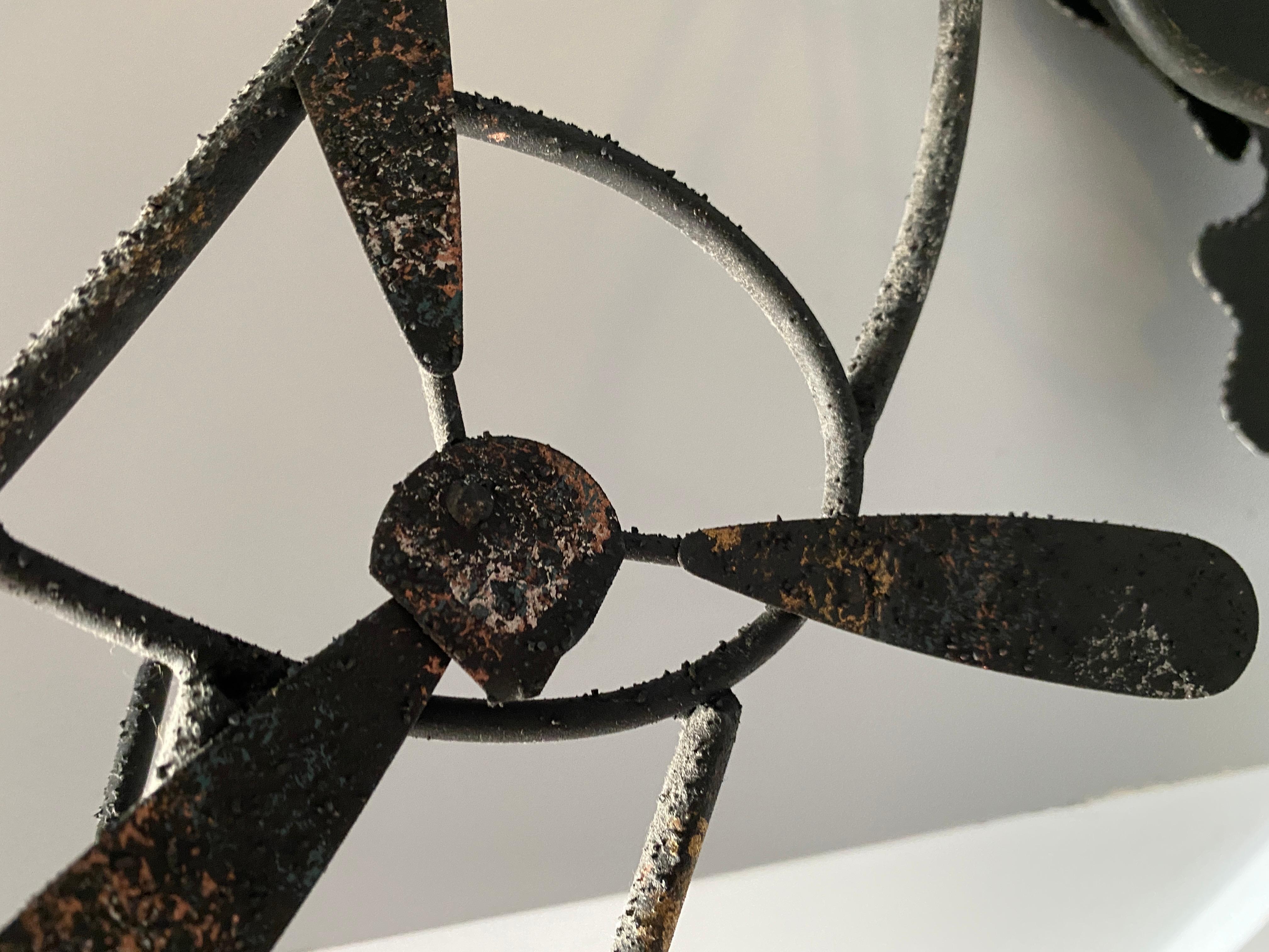 Curtis Jere, 'Casablanca', textured metal wall sculpture depicting the farewell scene from Casablanca. Signed to bottom edge of support frame, C. Jere, 1993. In two parts, consisting of a wall mounting support frame having an outline of airplane;