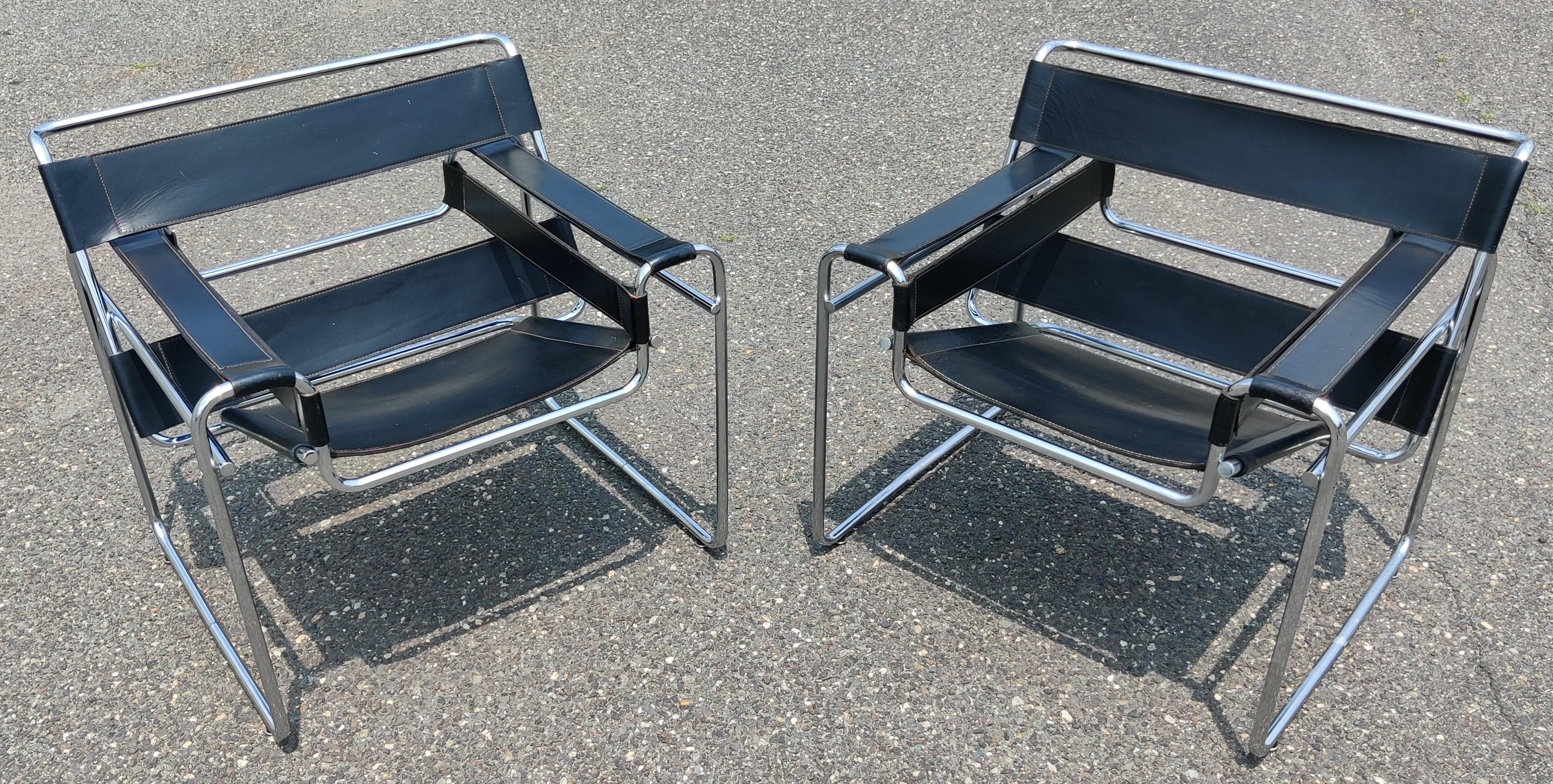 A rare pair of signed 1977 Marcel Breuer for Knoll pair of model B3 lounge chairs, also known as Wassily chairs. Originally designed for and named after Bauhaus artist Wassily Kandinsky circa 1926. These chairs are dated 1977. Notice the welded and