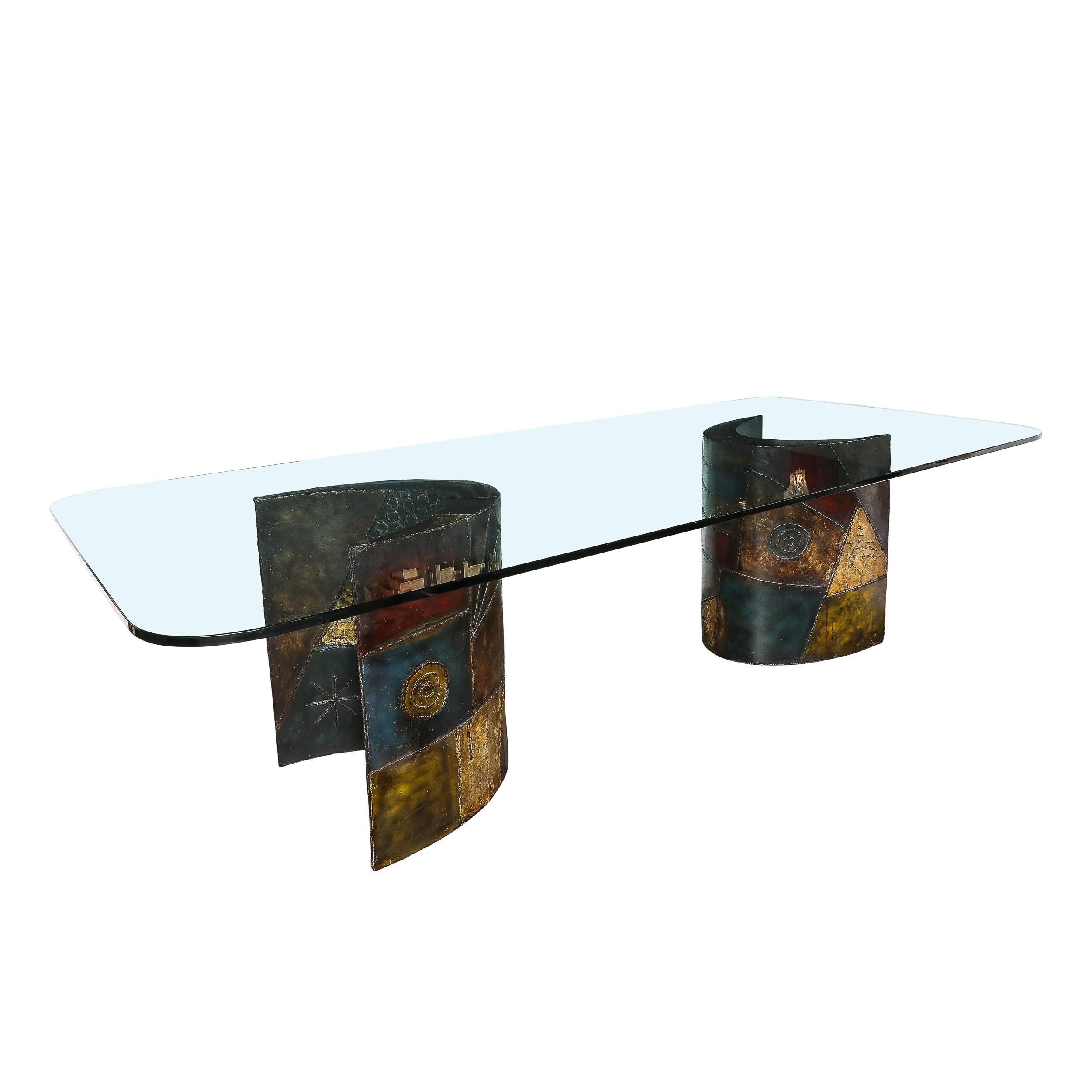 This monumental and materially stunning Signed & Dated Mid-Century Modernist Brutalist Paul Evans for Directional Dining Table originates from the United States, Circa 1970. Features a substantial glass top resting upon two horsehoe shaped supports