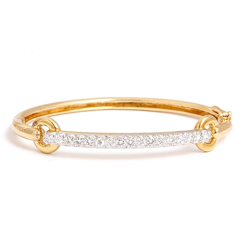 Rare Vintage Signed David Webb Ladies Diamond 18k Gold & Platinum Bangle Bracelet - . Beautiful oval shaped bangle. 18k yellow gold with 17 round brilliant cut diamonds set in platinum.  Apx. 1.70 ctw. Total weight of the bracelet is 18.6 grams. 