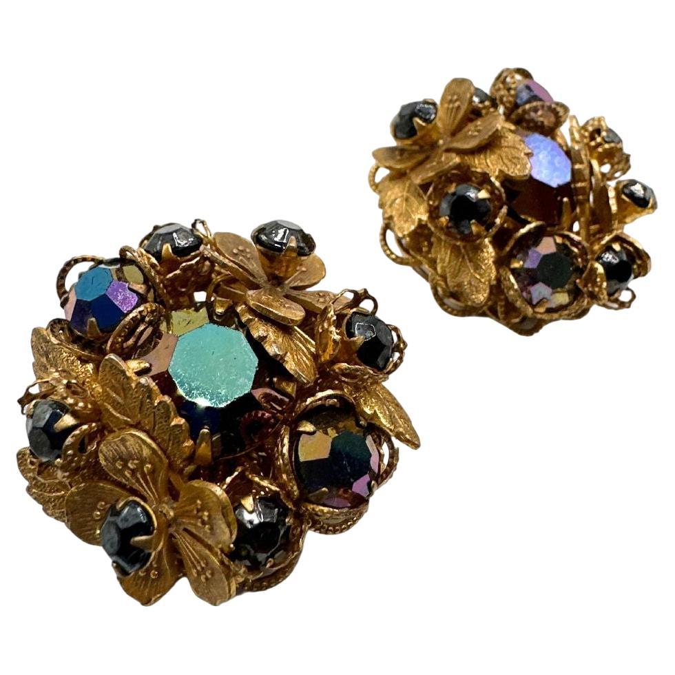 Earring Diameter: 1.10″

Bin Code: E15 / P2

Elevate your style with these stunning Vintage Demario’s Carnival Earrings. Crafted with meticulous attention to detail, these exquisite earrings are the epitome of elegance and charm.

These earrings are