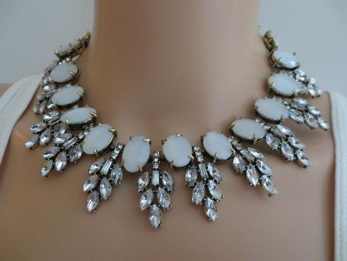 Beautiful vintage Designer Signed Oscar de la Renta Haute Couture Runway Necklace and Clip Earrings. Hand set Sparkling Ice Crystals and Opaque stones. Necklace measures approximately 18