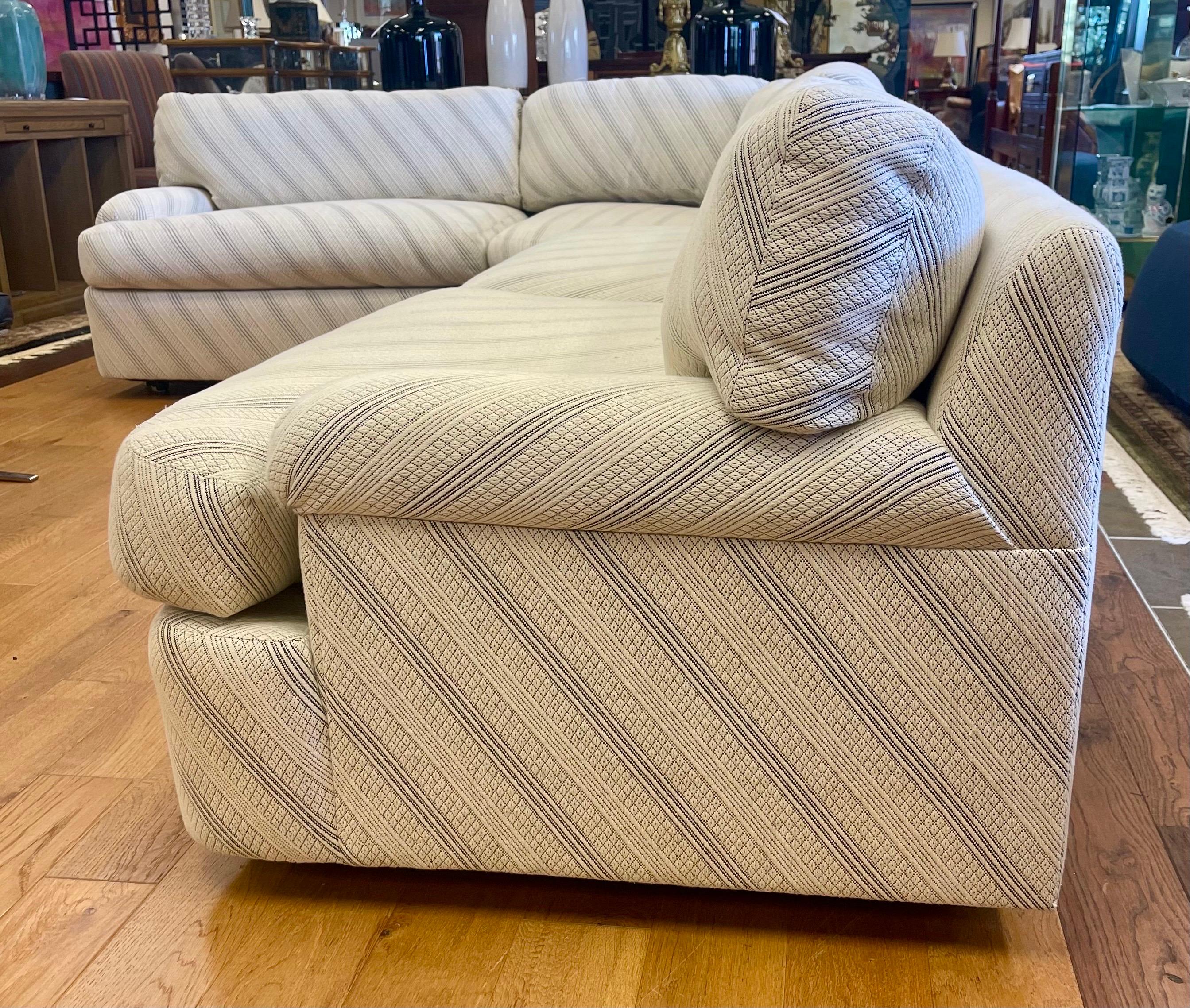 Stunning curved iconic mid century masterpiece from Directional Furniture circa 1970s.  Still in great condition with only age appropriate wear.  Three pieces and note the center curved piece can float for another option.
Fabric is an cream colored