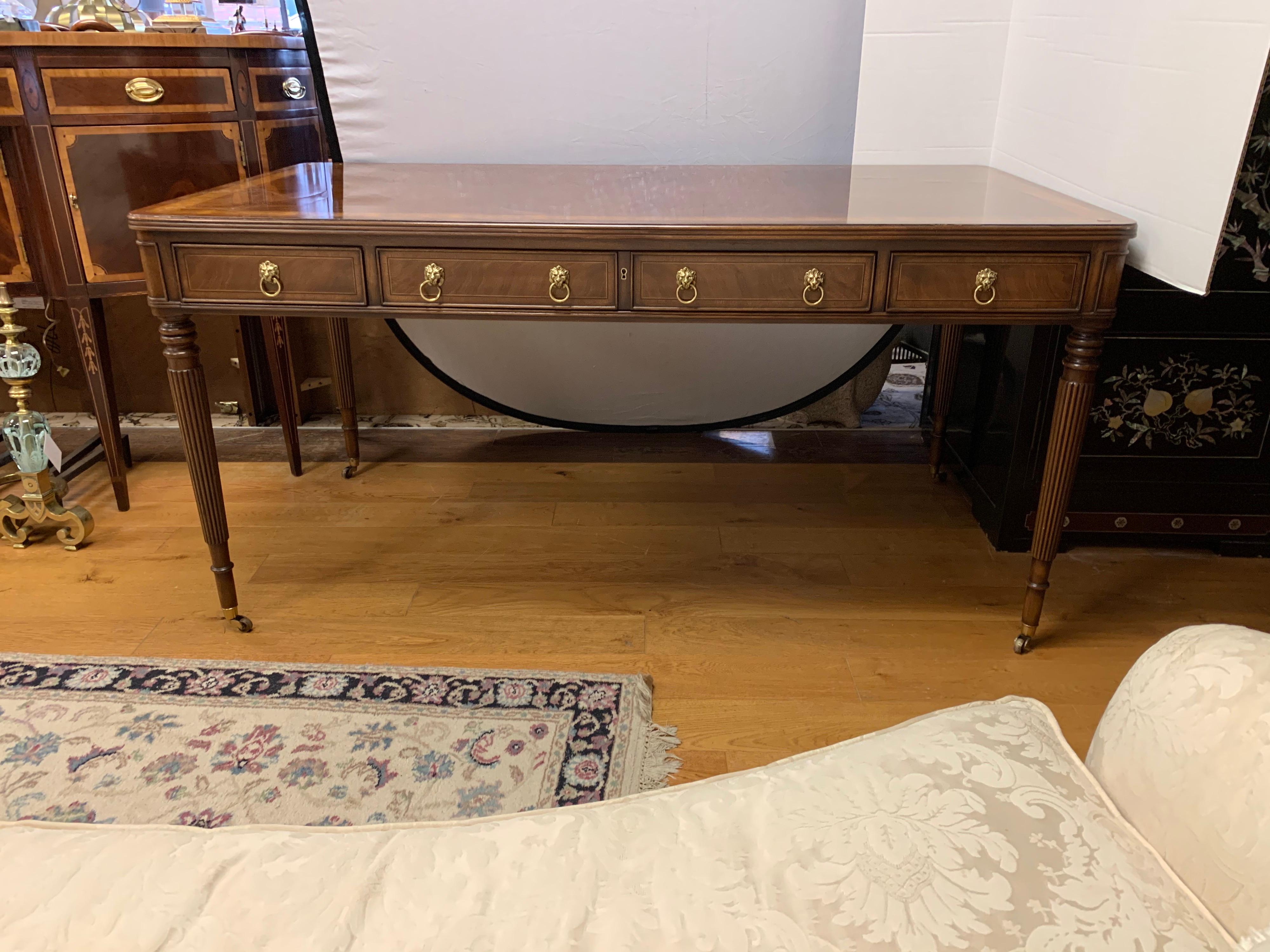 Stunning signed E.J. Victor mahogany inlay desk with drawers all around, some of which are faux.
Comes with custom glass top that can be used if you so desire to protect the top. All hardware is brass.
 