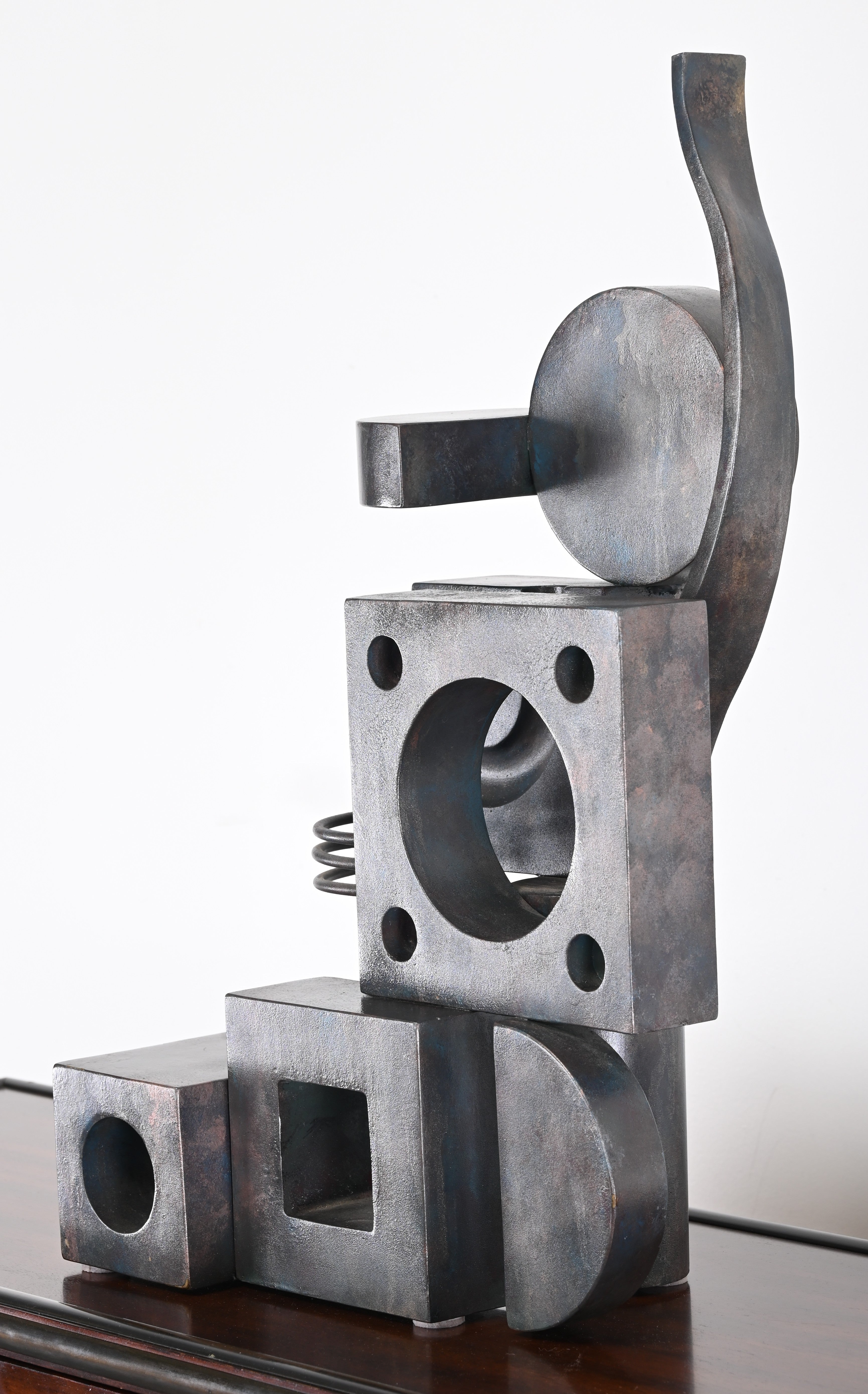 Eugene Perry is an award-winning abstract metal sculptor from Philadelphia who was a mentee of Jung Park. This piece is a captivating stainless-steel sculpture.  Etched signature 