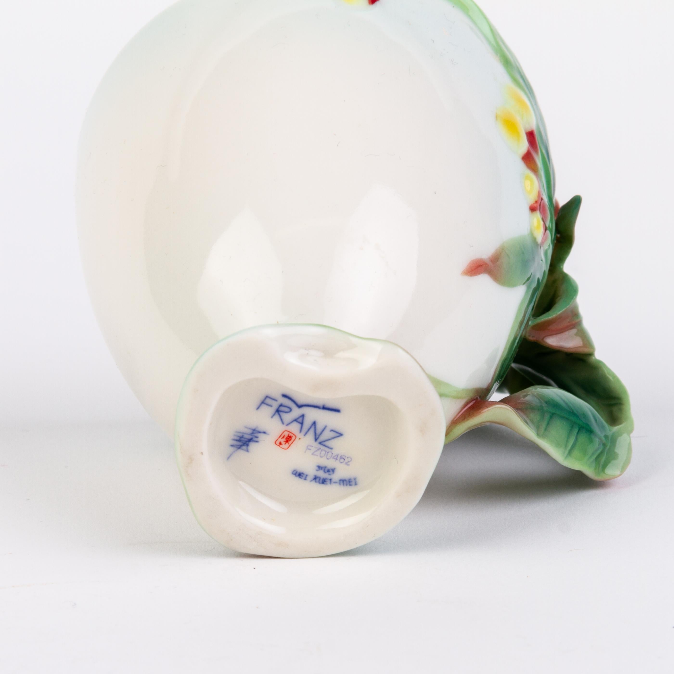 20th Century Signed Franz Porcelain Relief Floral Teacup Designed by May Wei-Xuet Mei For Sale