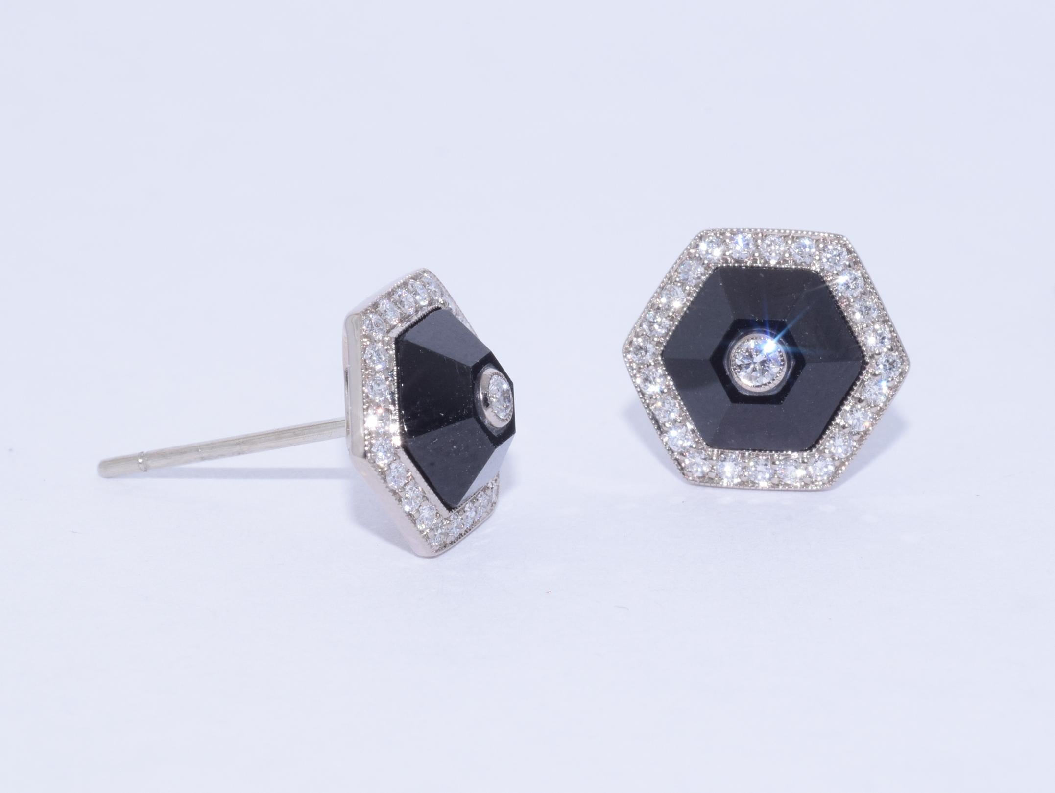 Faceted hexagons of black jade are bordered with round diamonds totaling approximately 0.35 carat mounted in 18 karat white gold.

Fred Leighton is renowned for extraordinary collections of vintage and contemporary jewelry. New signature creations