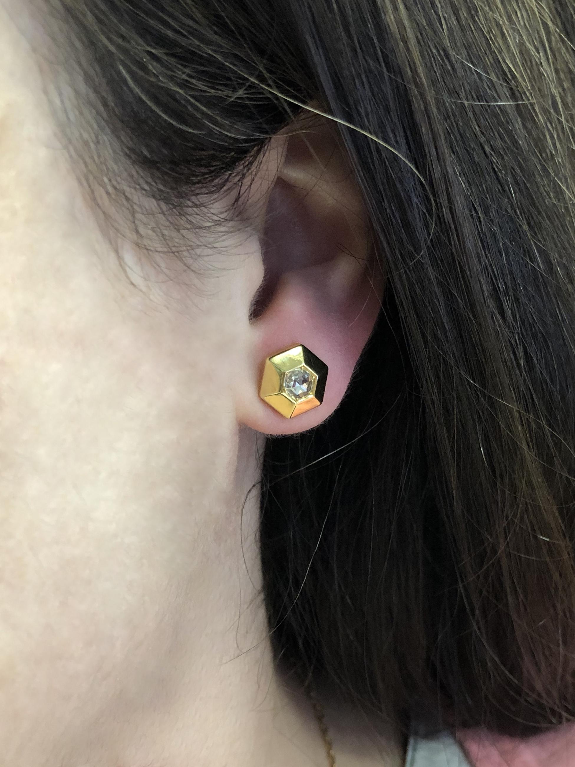 Hexagonal studs are inset with rose cut diamonds totaling approximately 0.40 carat mounted in 18 karat yellow gold, signed Fred Leighton.   
Diameter approx. 0.40 inch.    

Fred Leighton is renowned for extraordinary collections of vintage and