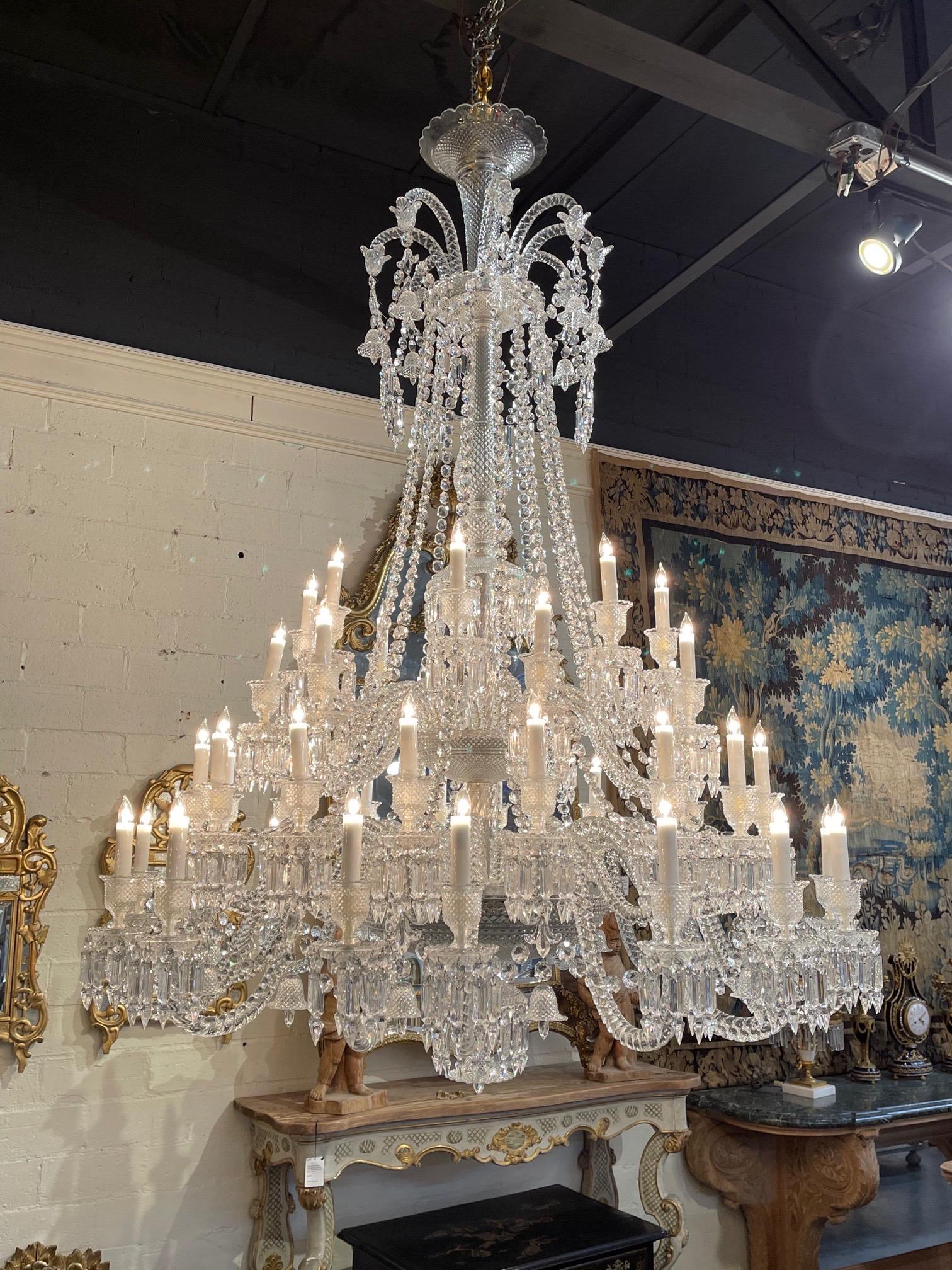 Spectacular signed French Baccarat chandelier with 48 lights. Large scale and very Fine quality. A glistening beauty that is sure to impress! Note: Current price from the factory for this chandelier is $155000.