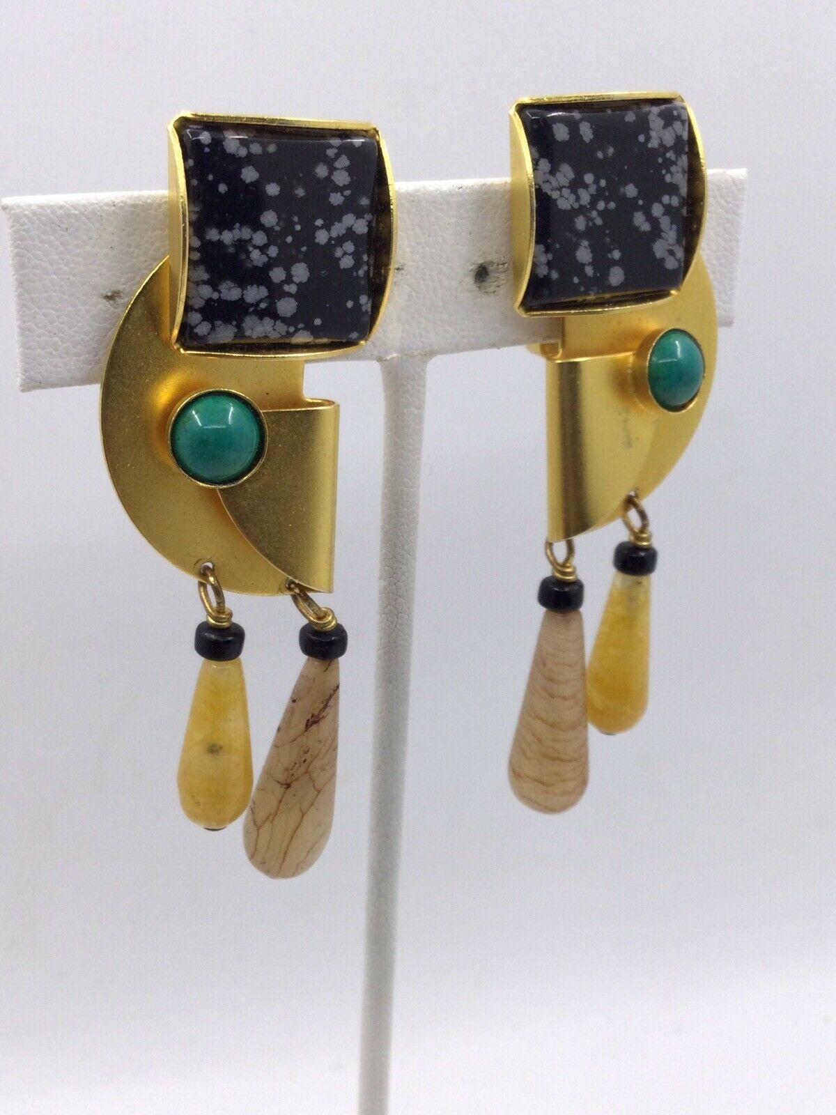 Fabulous Signed Gale Rothstein Designer Modernist Long Multi-Gem Dangle Earrings. 18K Gold plate over brass. Measuring approx. 2 1/2” long X 7/8” wide. Striking Abstract design. Signed on the back: GALE ROTHSTEIN II. Circa: 1980s. More Beautiful in