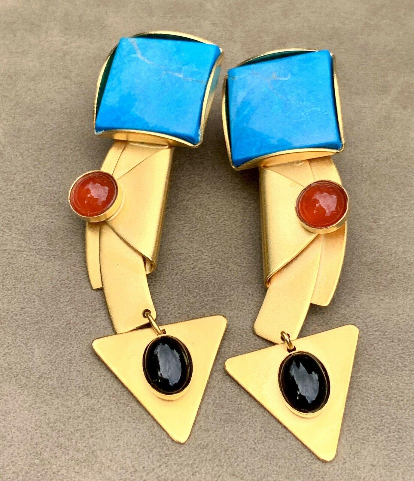 Fabulous Signed Gale Rothstein Designer Modernist Long Multi-Gem Turquoise, Onyx and Carnelian Agate Dangle Earrings. 18K Gold plate over brass. Measuring approx. 2.5” long x 0.5” wide. Striking Abstract design. Signed on the back: GALE ROTHSTEIN