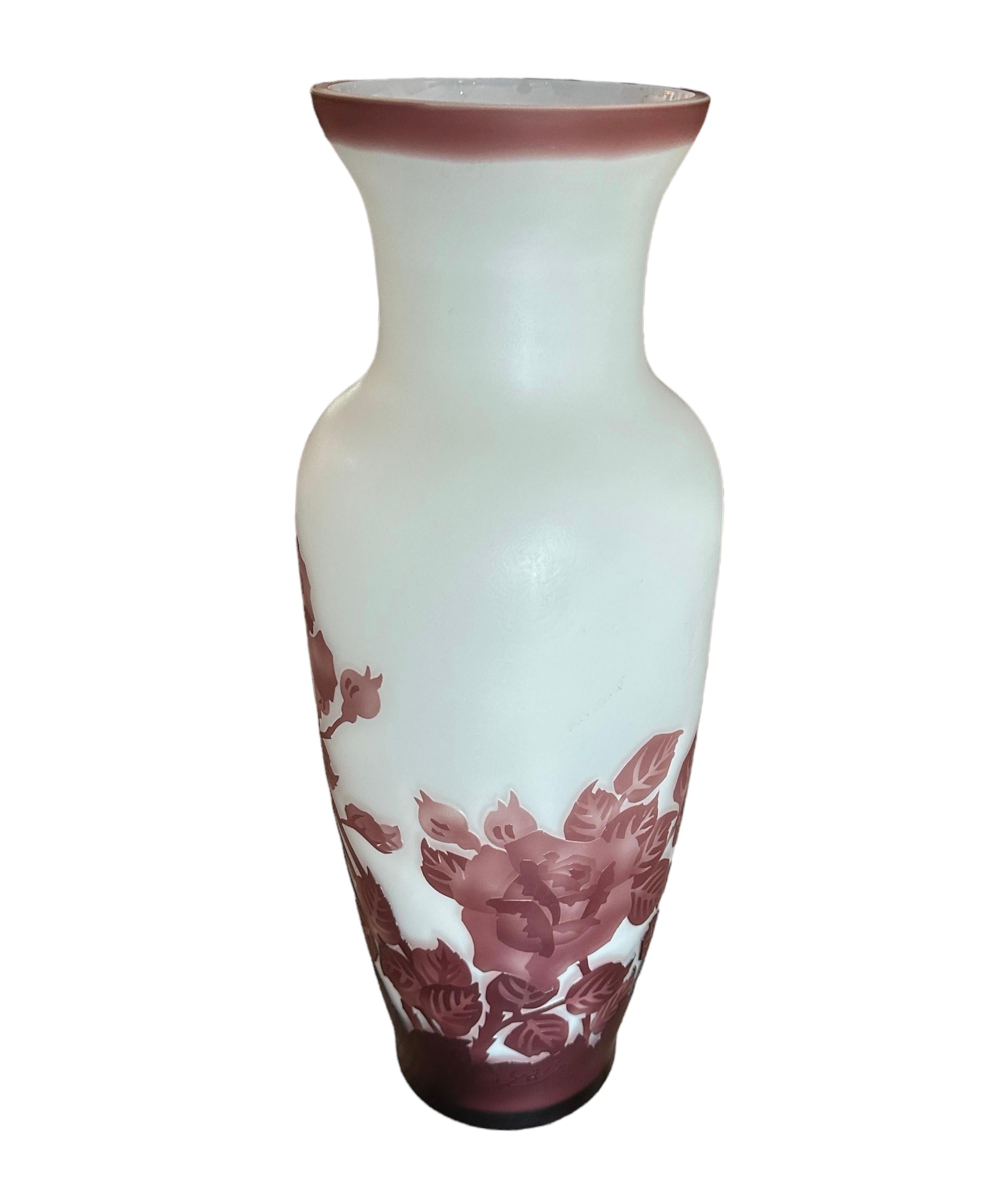 This is truly a beautiful vase,signed by Galle elegant and heavy and weight, smooth to the touch, but the roses are etched onto the glass, has an extraordinary feel in the colors of the burgundy towards the bottom, get richer and deeper, and as the