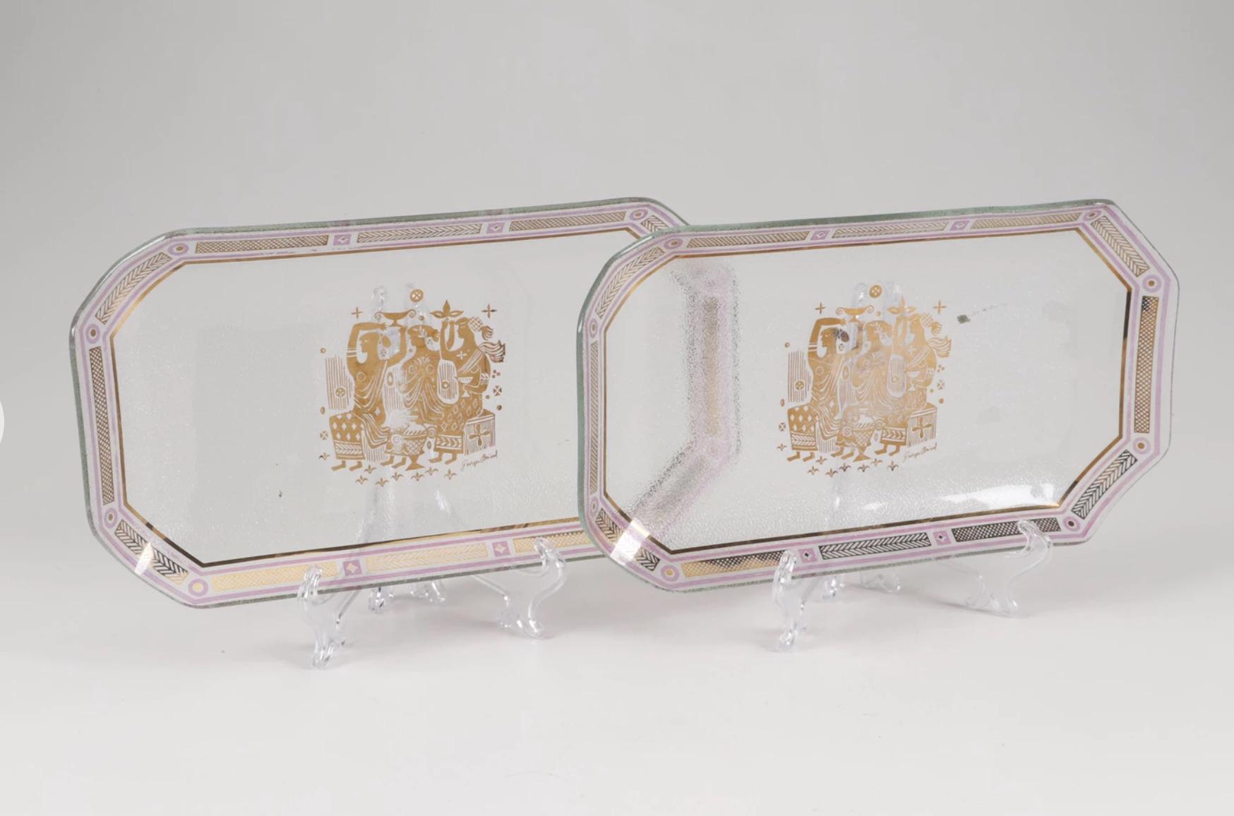 Set of 3 1950s Mid-Century Modern unique designer glass serving trays by Georges Briard,
clear glass with decorated Briard's gold neoclassic maidens designs and classic geometric gold and black decorative trim around the edges.
Signed- Georges