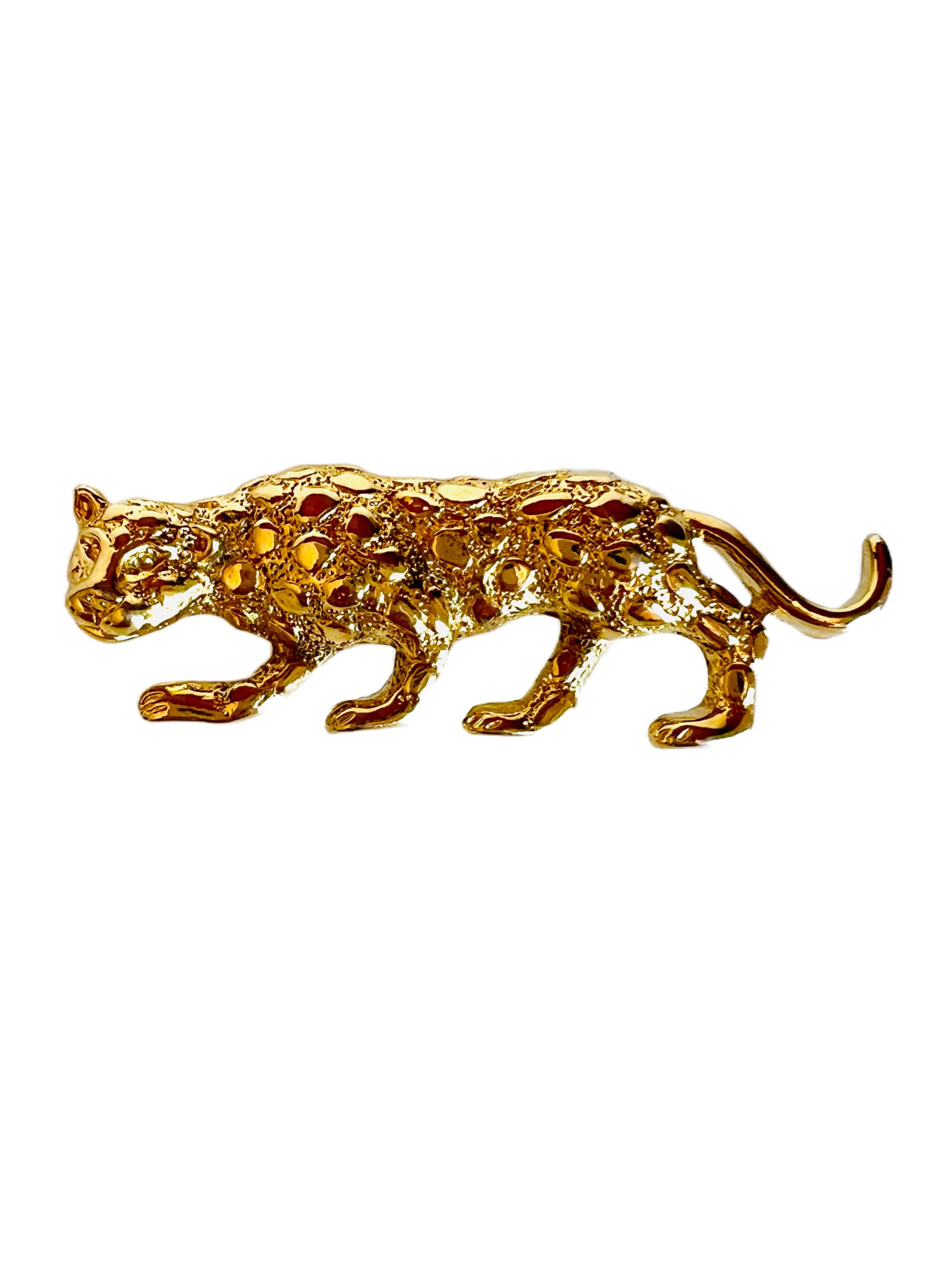 Broche vintage signée Gerry's figural crouching leopard brooch. 

Taille : 2-1/4