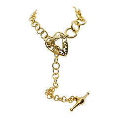 Signed Gucci 18 Karat Gold Link Toggle Necklace with Heart Shaped Center Piece