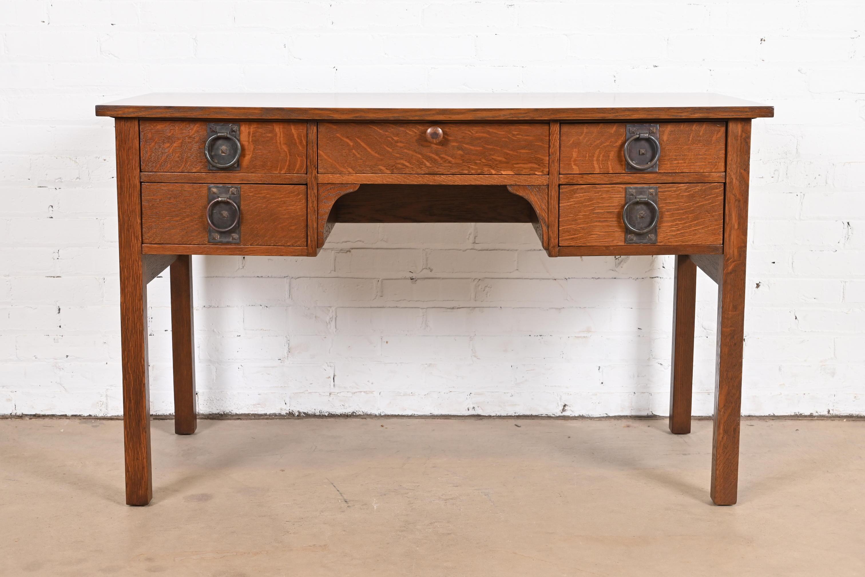 A rare and exceptional antique Mission or Arts & Crafts writing desk

By Gustav Stickley (original label present)

USA, Early 20th Century

Solid quarter sawn oak, with original hammered copper hardware.

Measures: 48