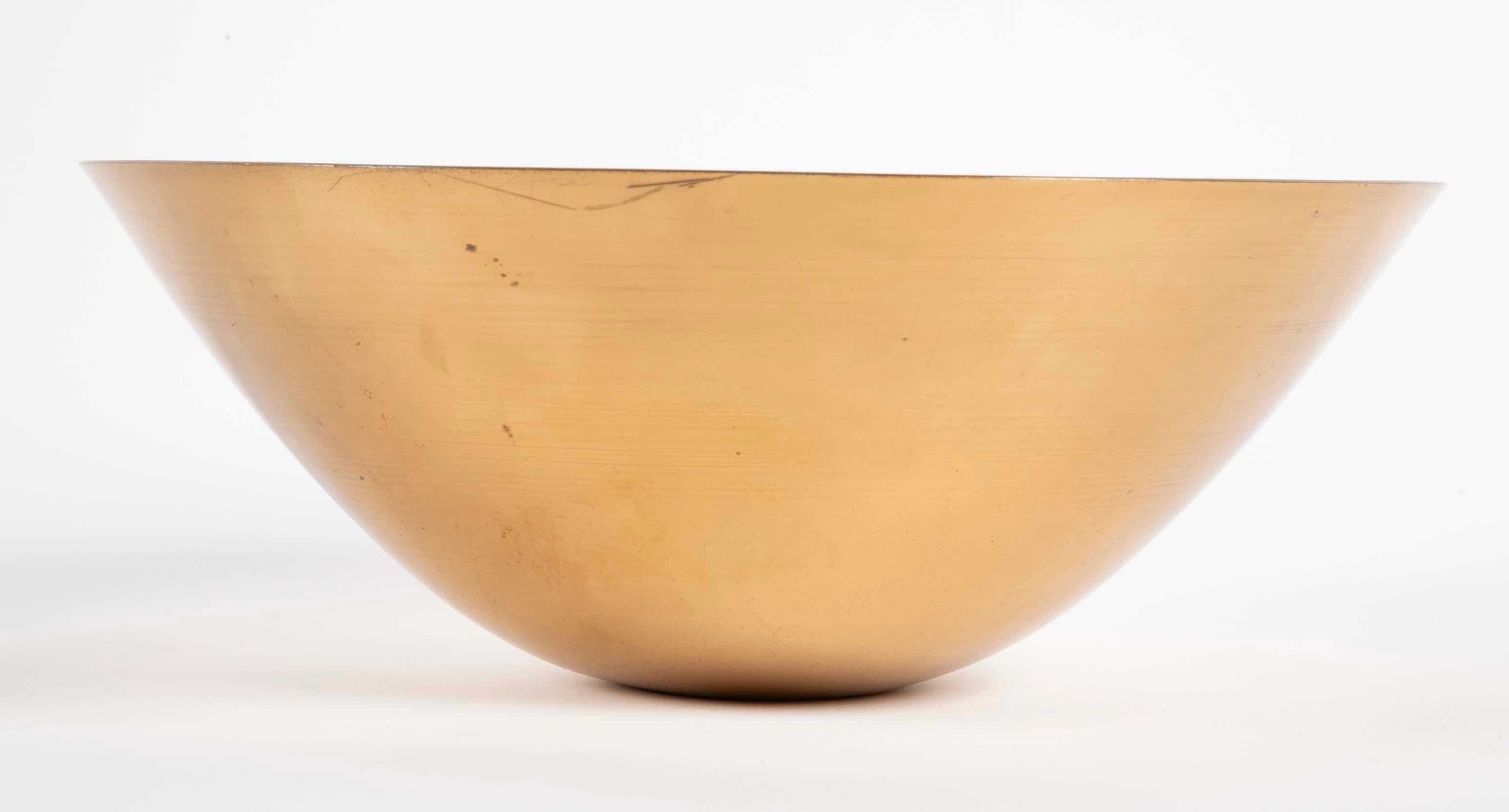 A signed, hand spun brass flared bowl by Ronald Hayes Pearson. (American. 1924 - 1996).