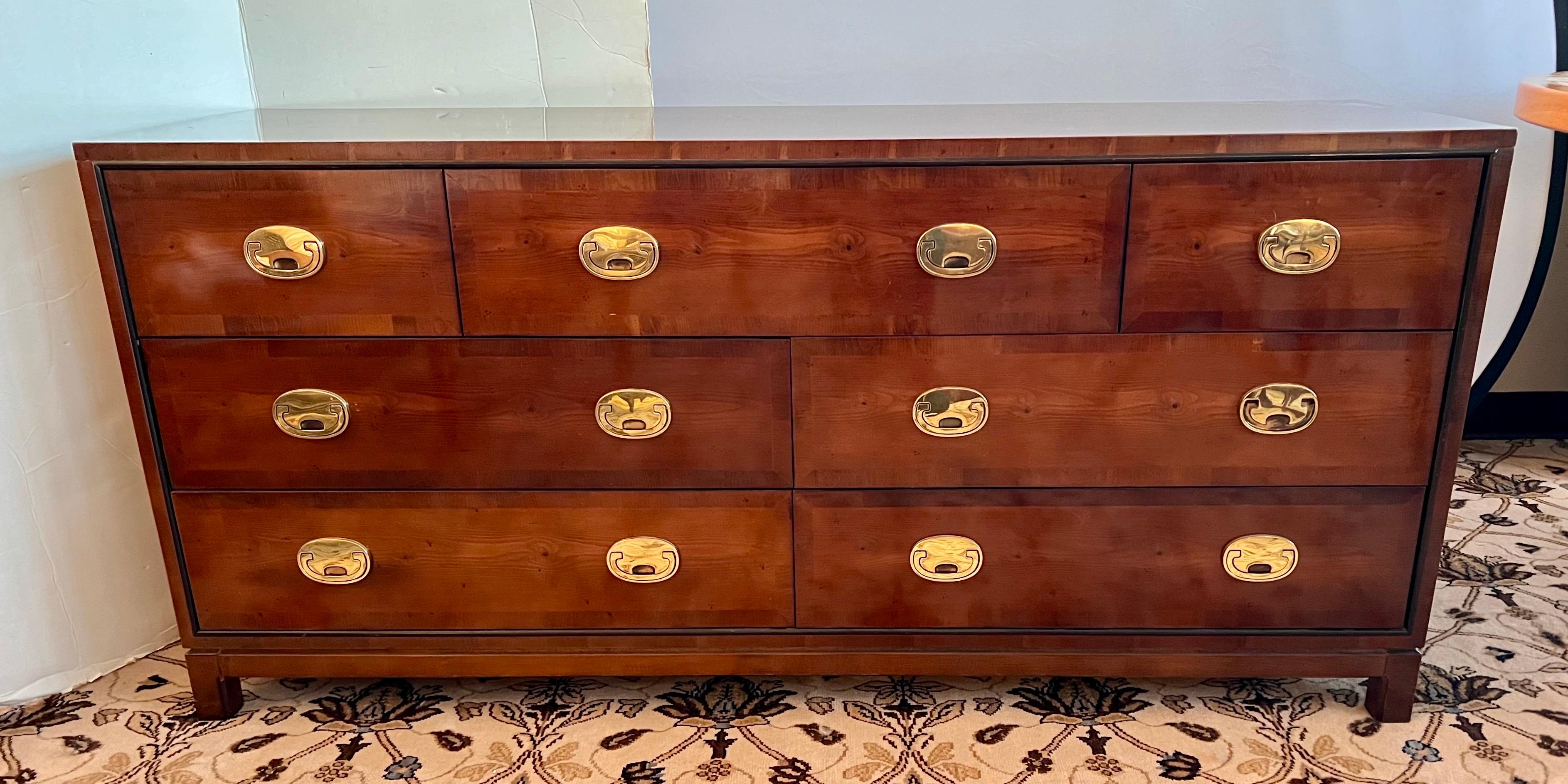 Elegant and coveted signed Hickory White mahogany Campaign Style sever drawer dresser.  A chest of drawers that will stop traffic.  Note the brass hardware, nothing short of gorgeous.  Why not own the best?