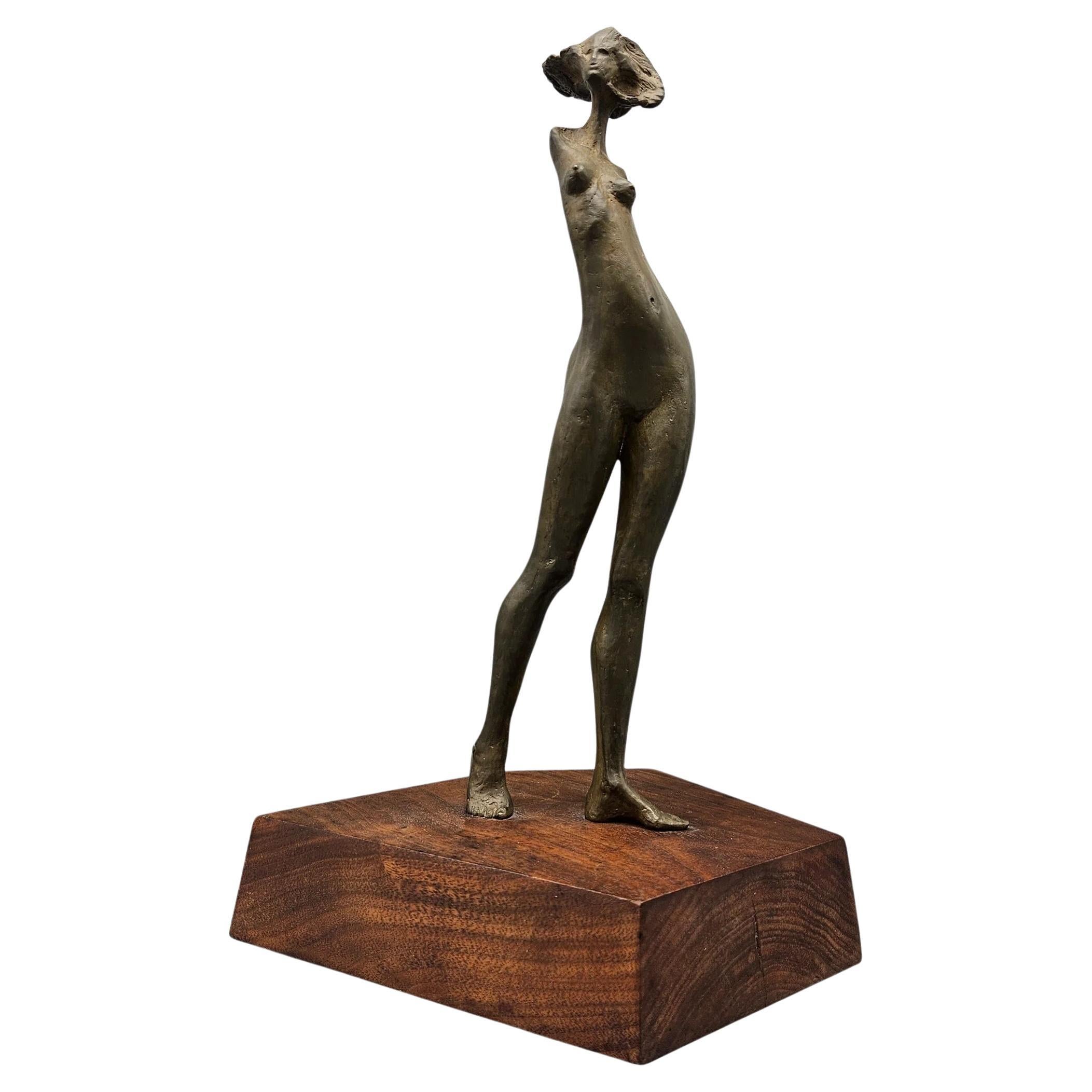 Escultura modernista femenina desnuda en bronce sobre base de nogal firmada por Immi Storrs
